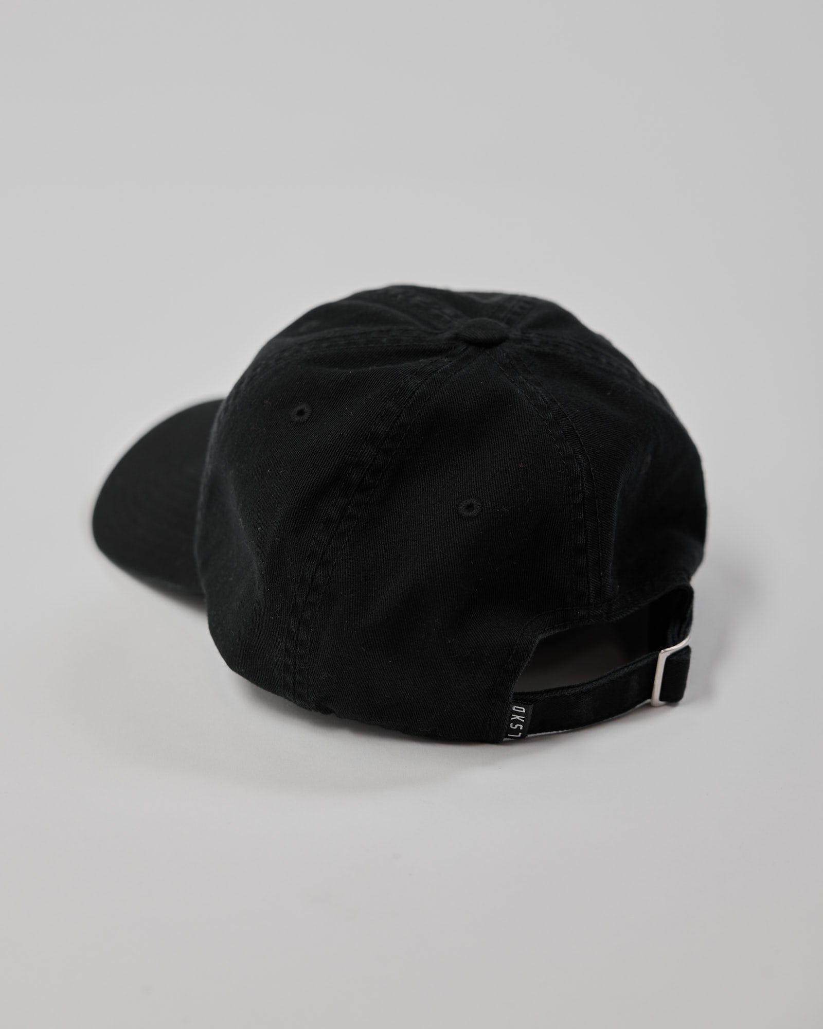 Model wearing Compact Cap - Black