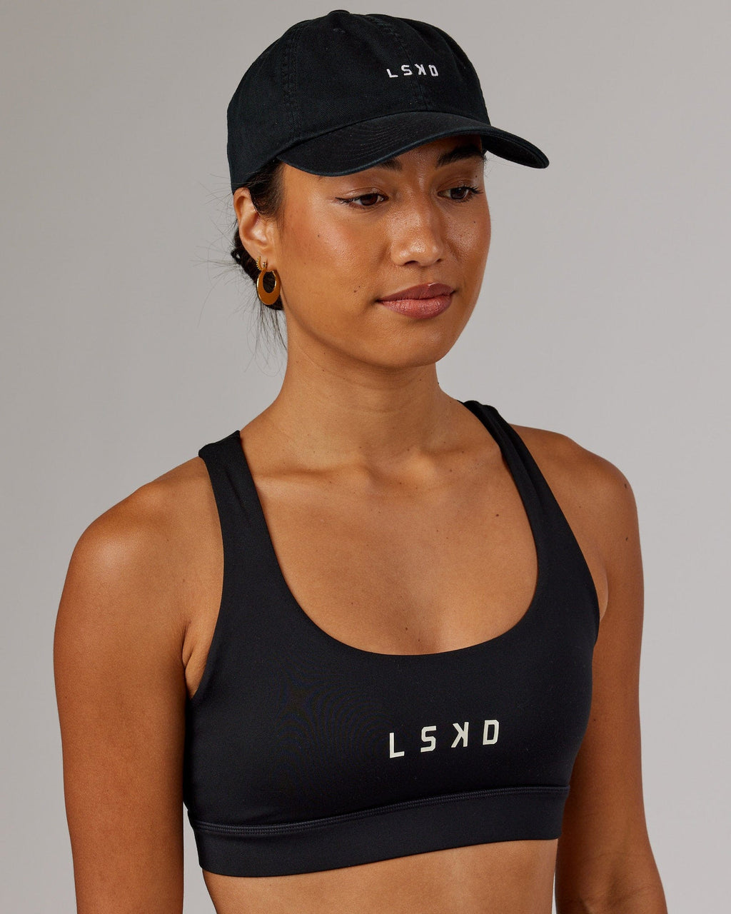 Model wearing Compact Cap - Black