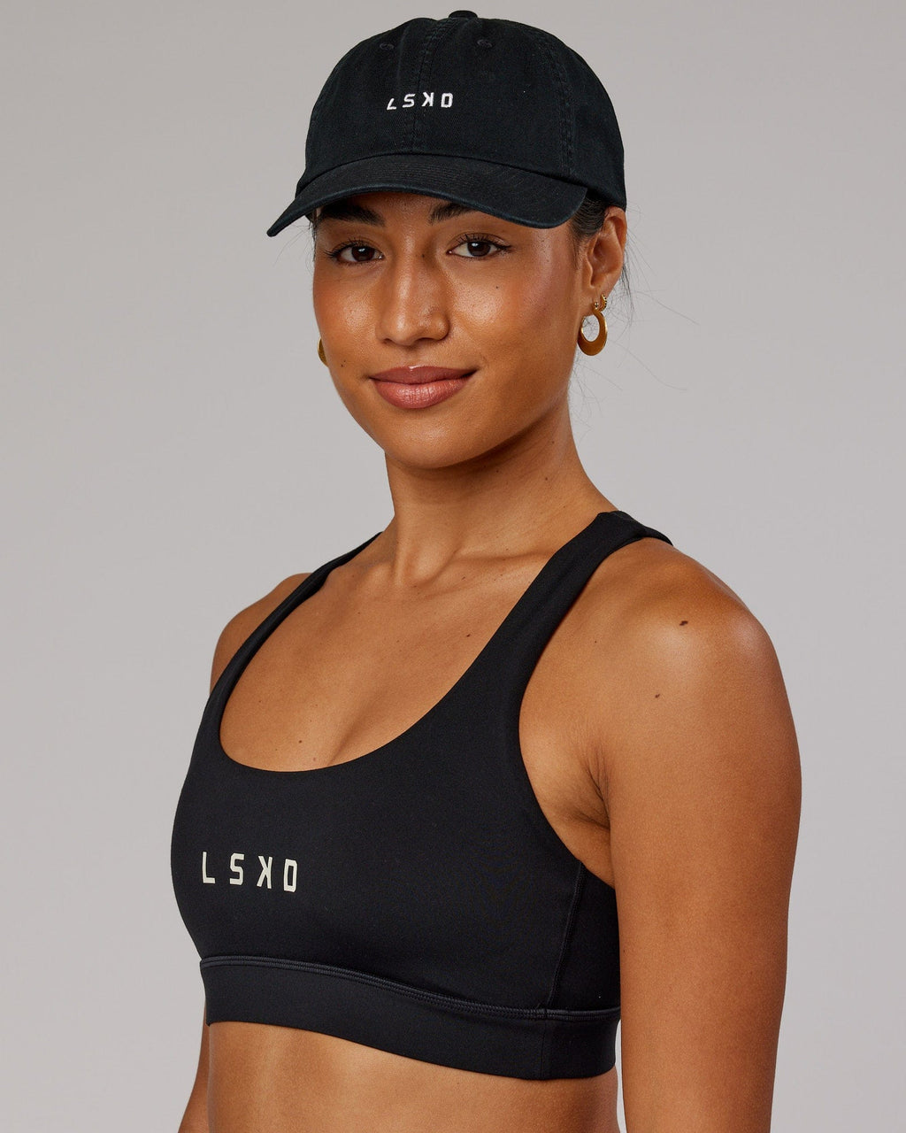 Model wearing Compact Cap - Black
