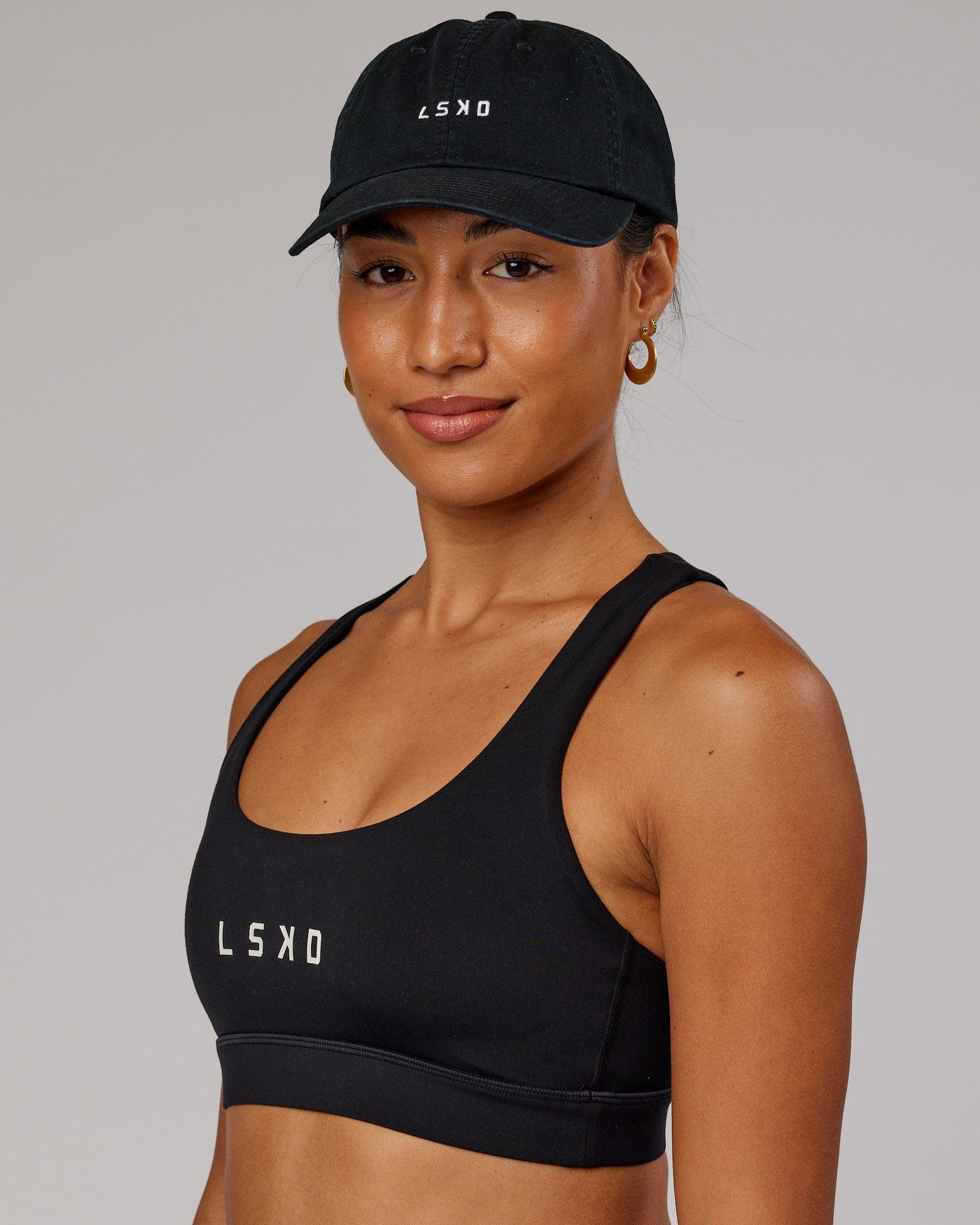 Model wearing Compact Cap - Black