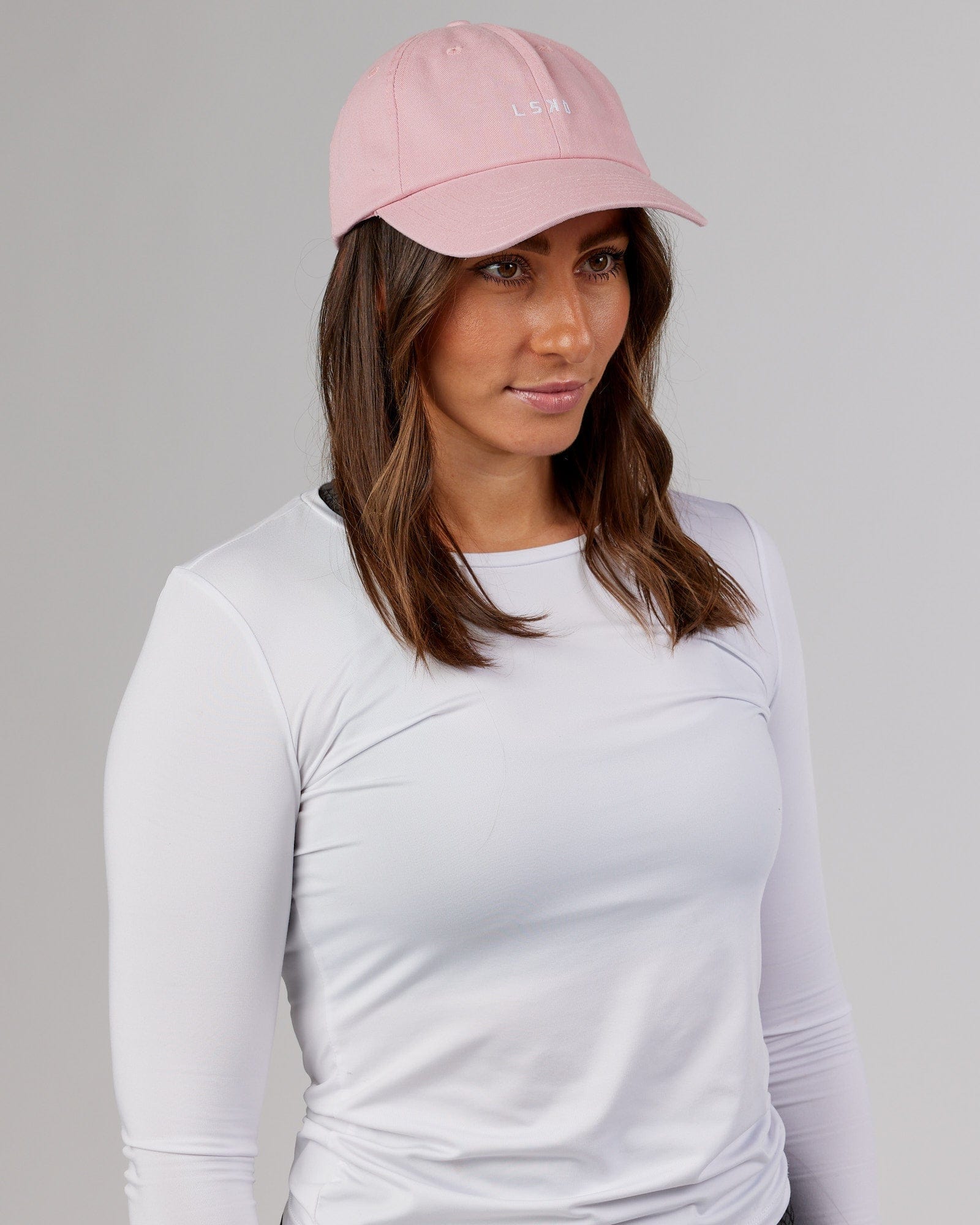 Model wearing Compact Cap - Bleached Mauve