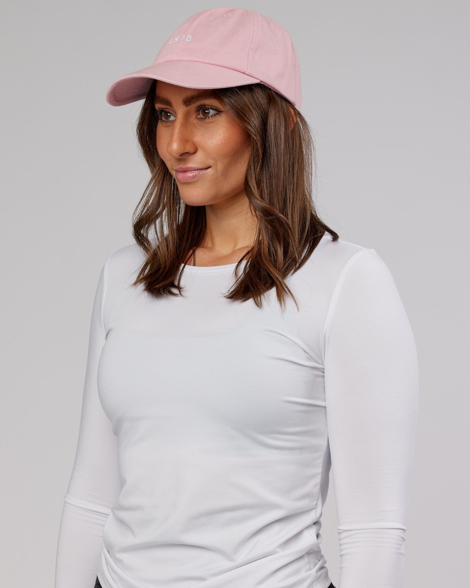 Model wearing Compact Cap - Bleached Mauve