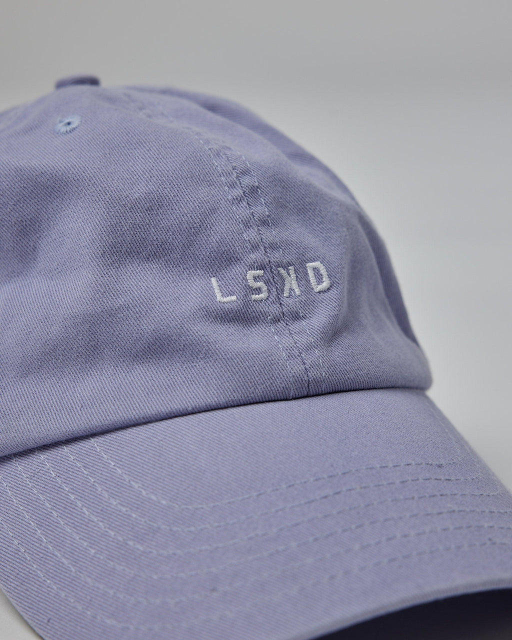 Model wearing Compact Hat - Cosmic Sky