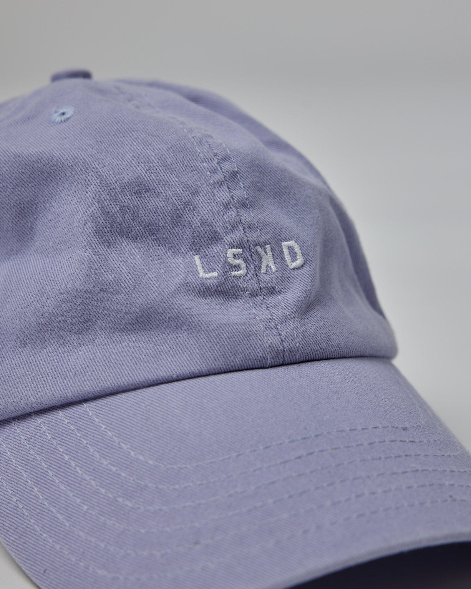 Model wearing Compact Hat - Cosmic Sky