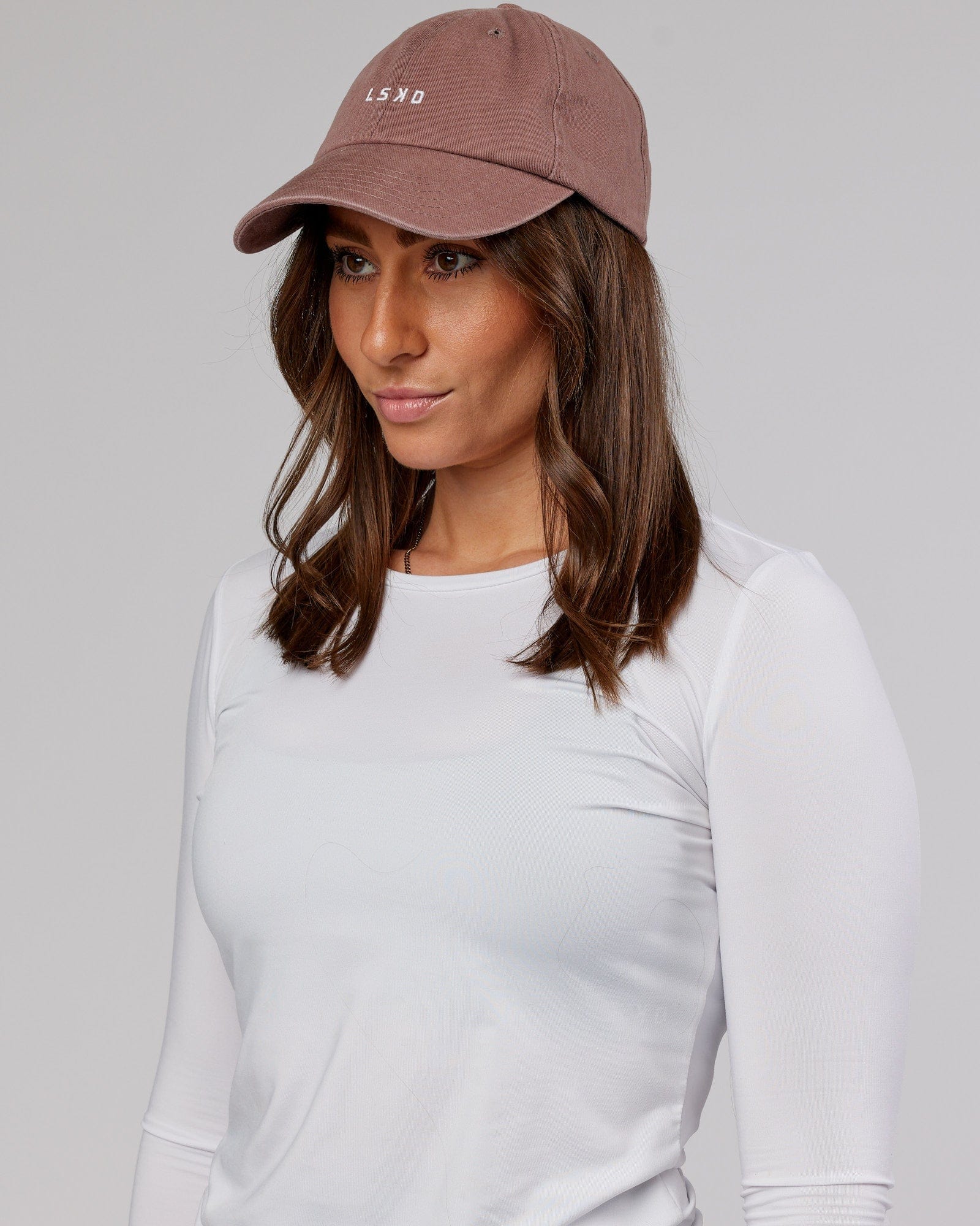 Model wearing Compact Cap - Deep Taupe