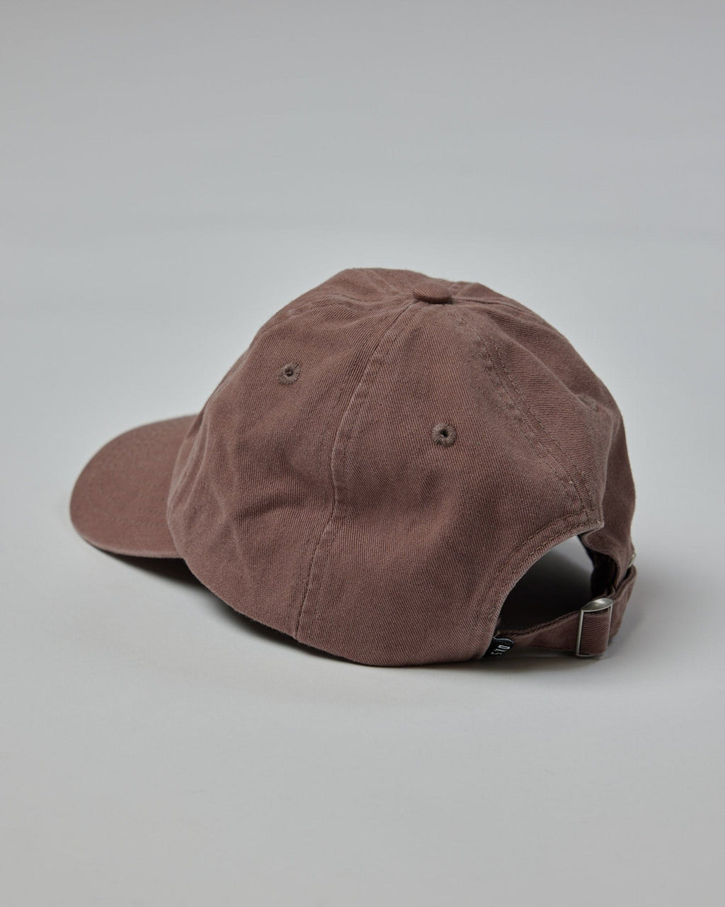 Model wearing Compact Cap - Deep Taupe