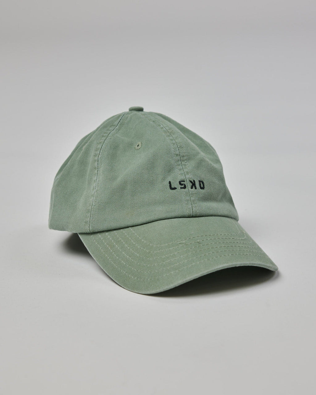 Model wearing Compact Cap - Desert Sage