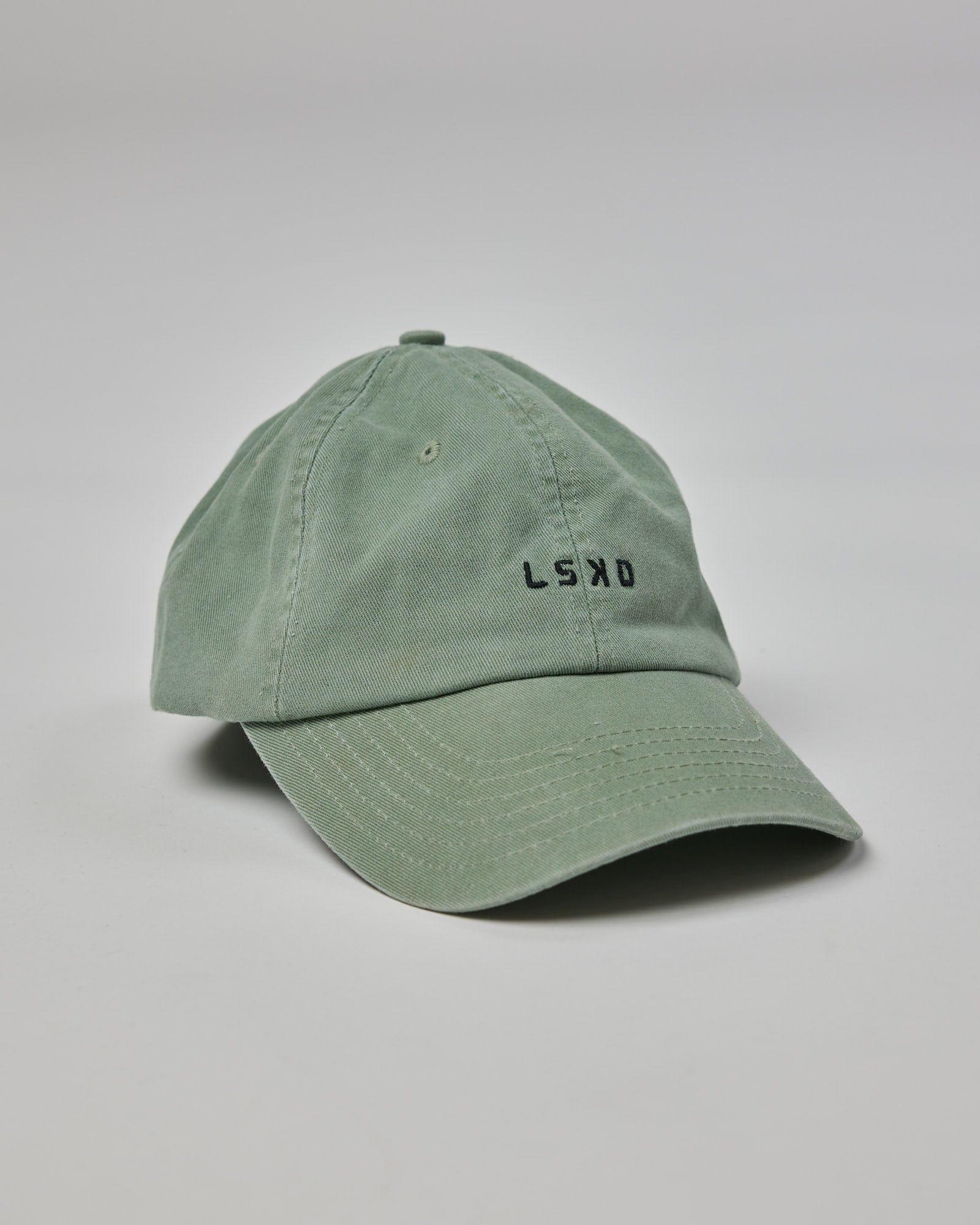 Model wearing Compact Cap - Desert Sage