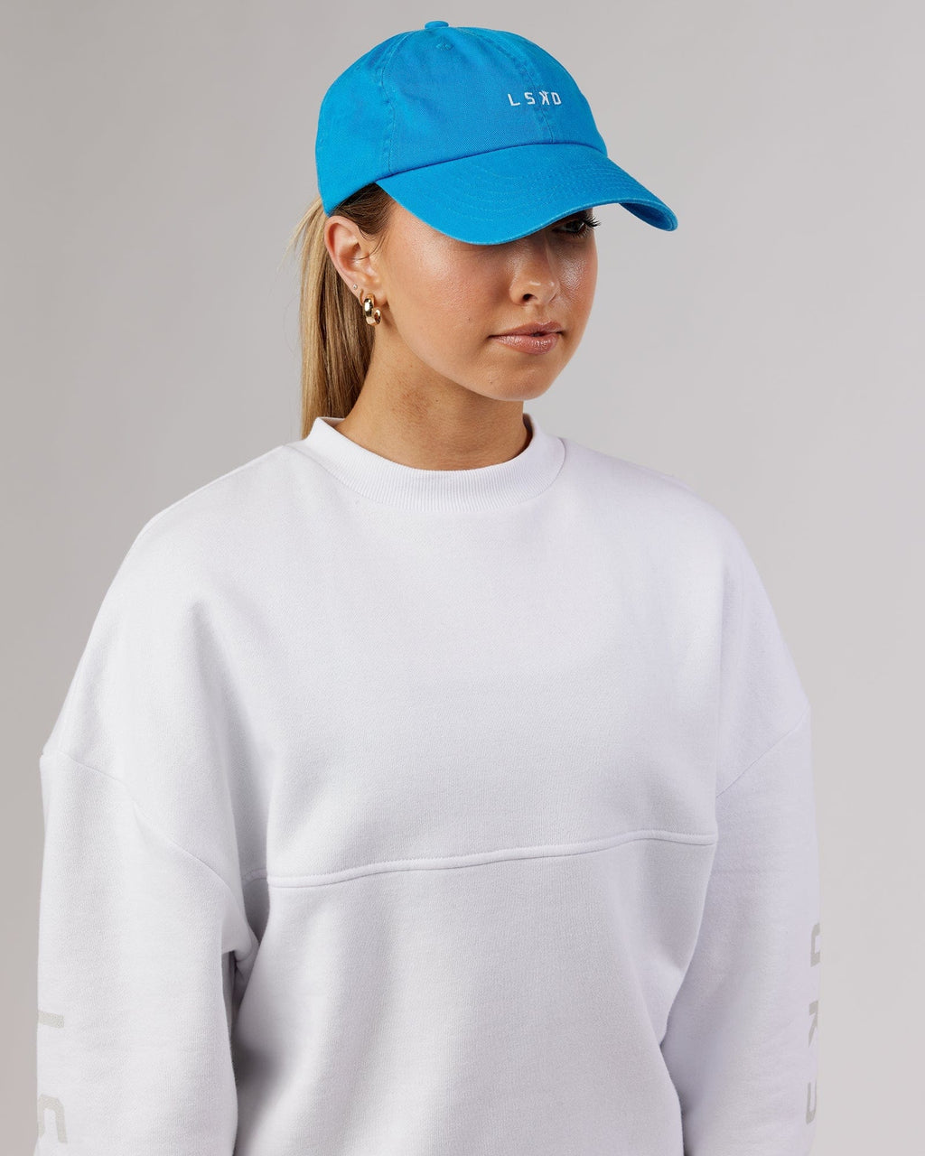 Model wearing Compact Cap - Washed Ibiza Blue