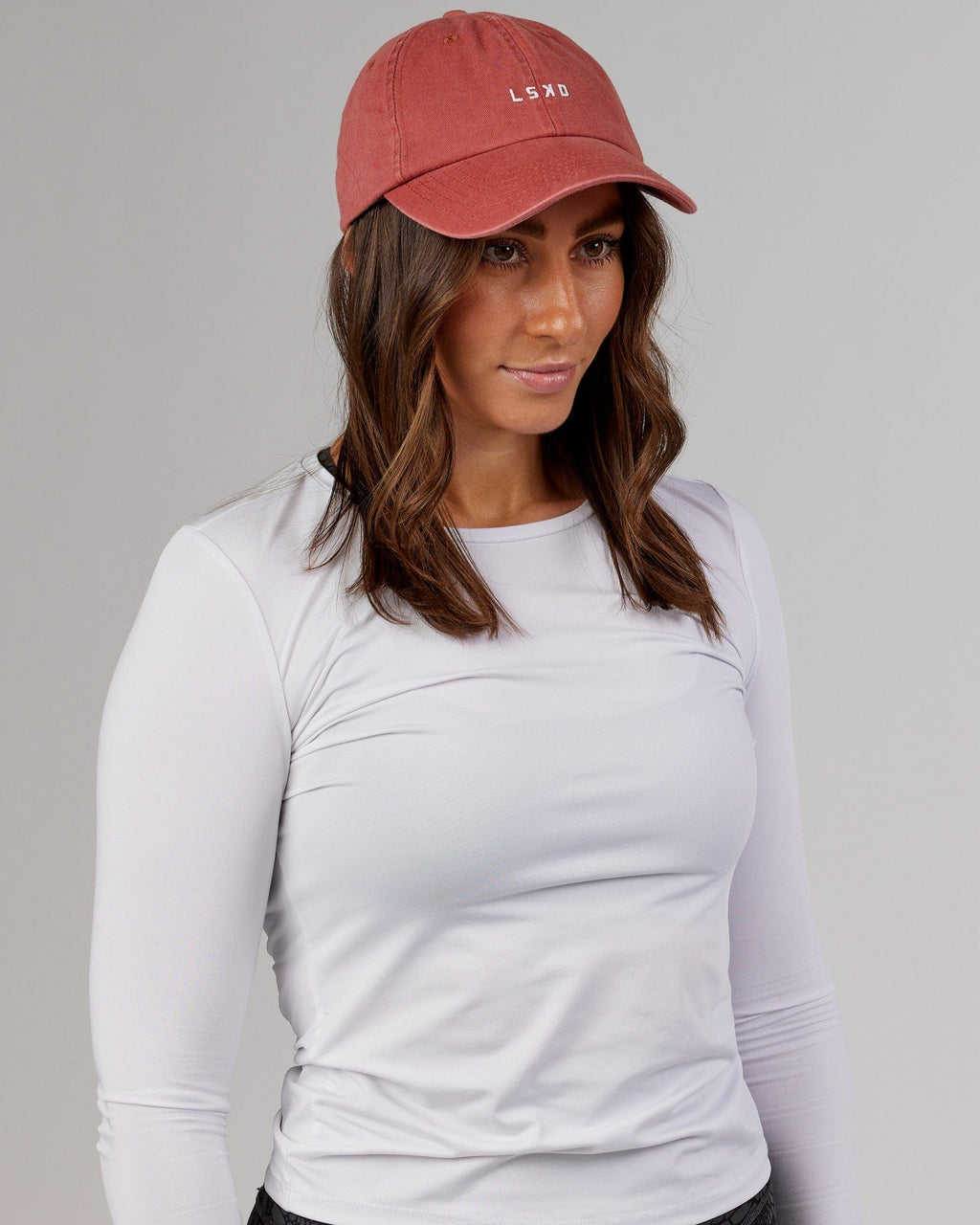 Model wearing Compact Cap - Marsala