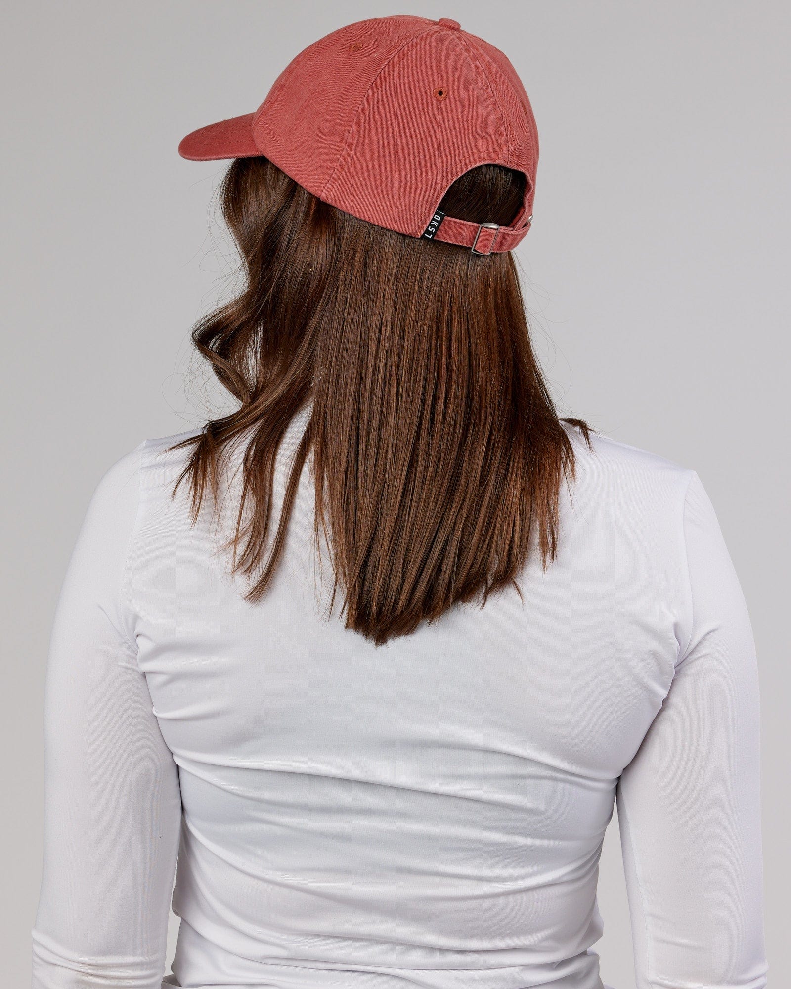 Model wearing Compact Cap - Marsala