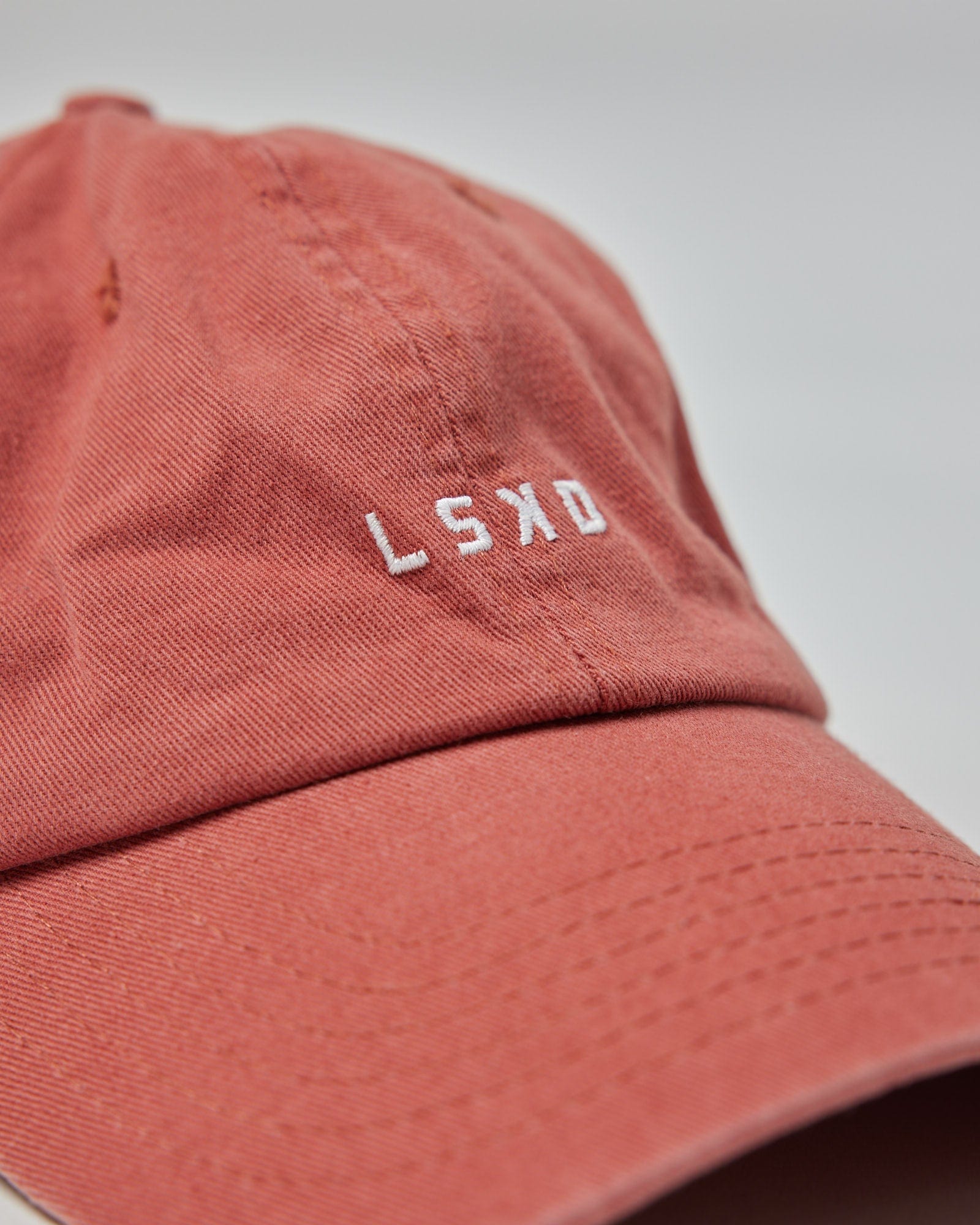 Model wearing Compact Cap - Marsala