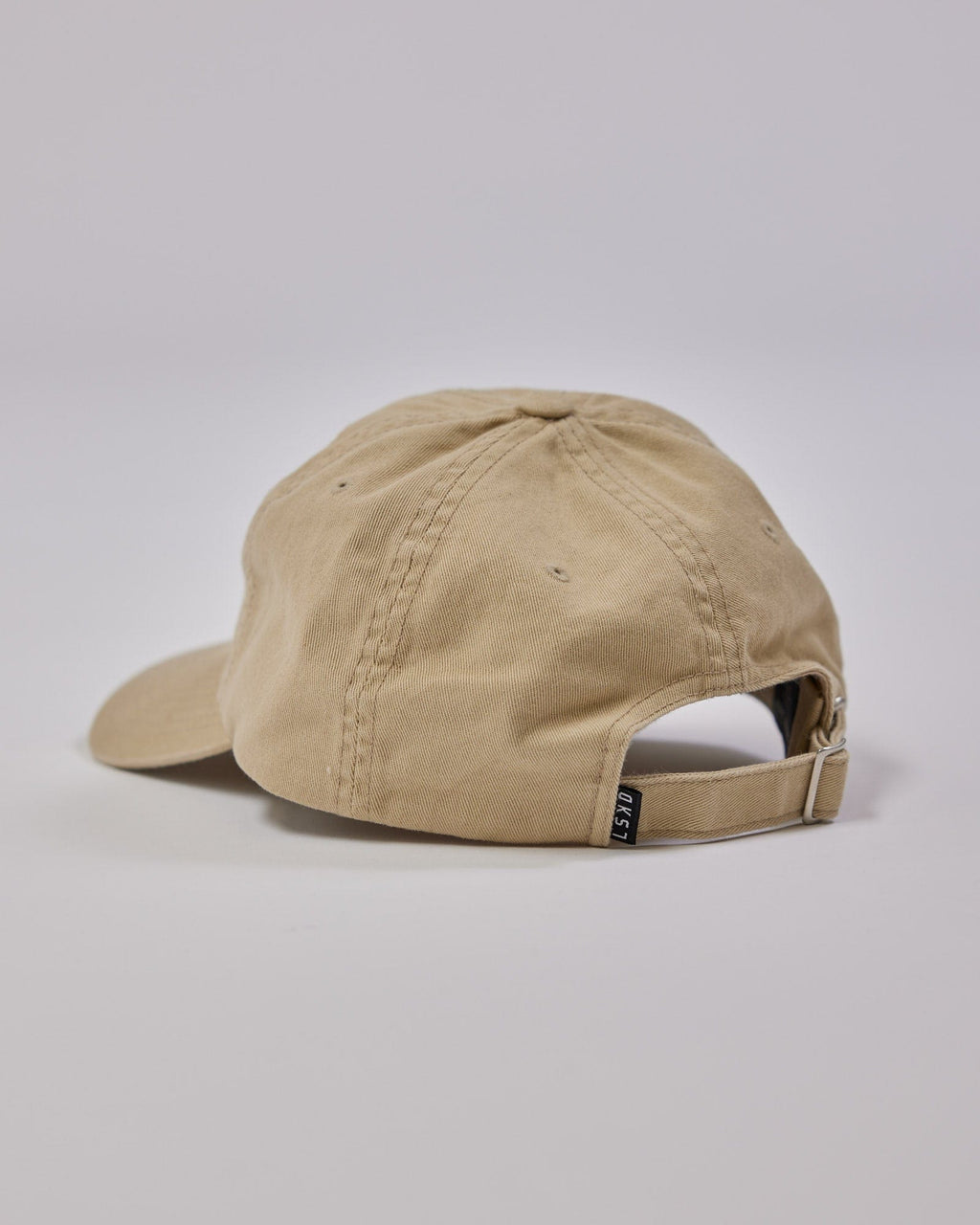 Model wearing Compact Cap - Pale Khaki