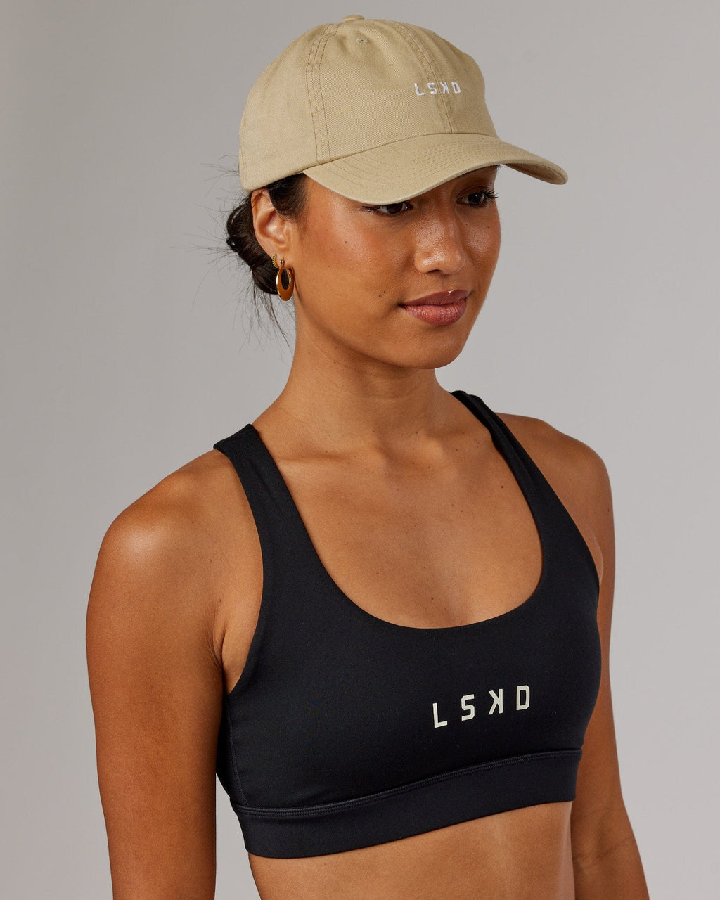 Model wearing Compact Cap - Pale Khaki