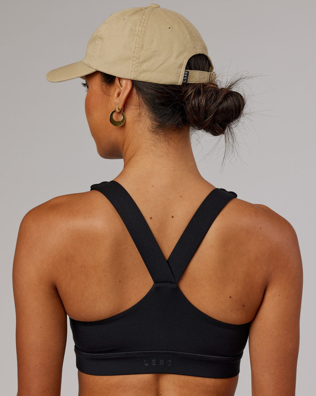 Model wearing Compact Cap - Pale Khaki