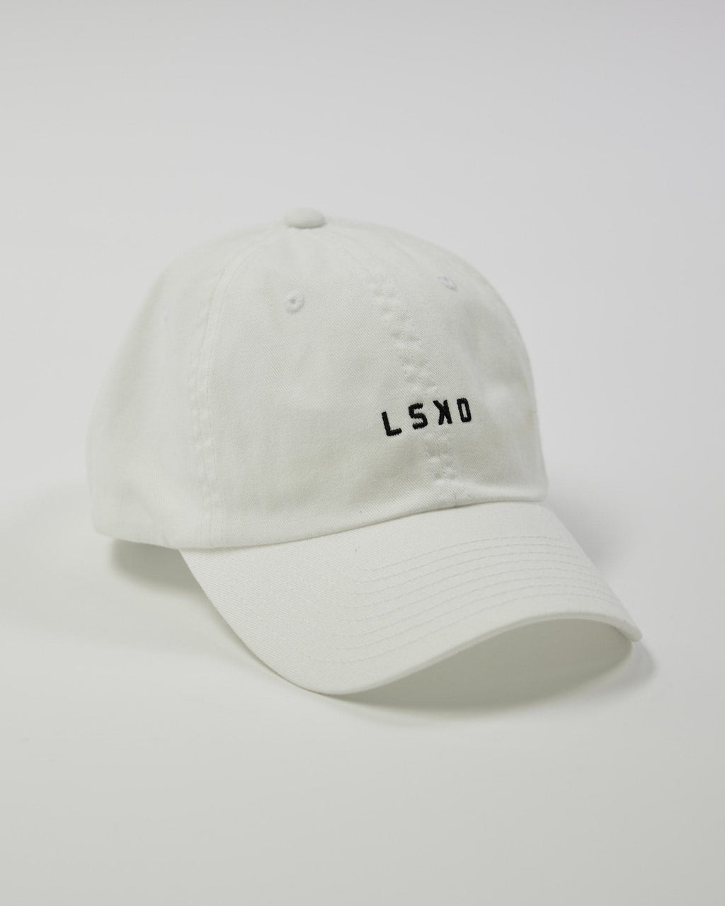 Model wearing Compact Cap - White