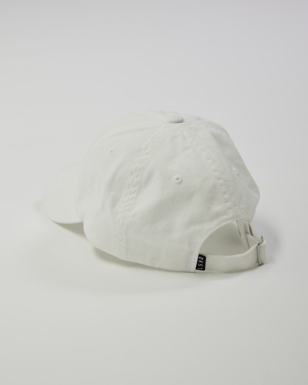 Model wearing Compact Cap - White