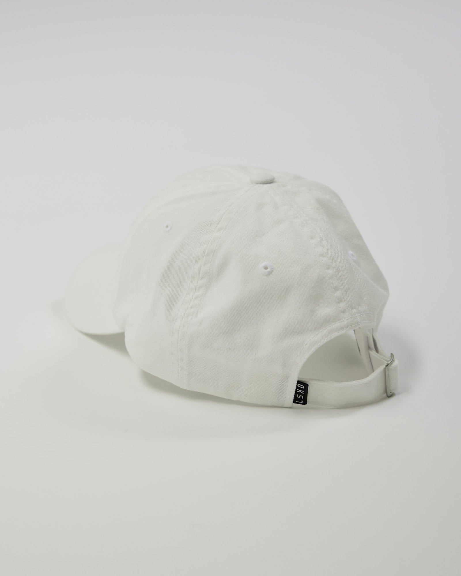 Model wearing Compact Cap - White