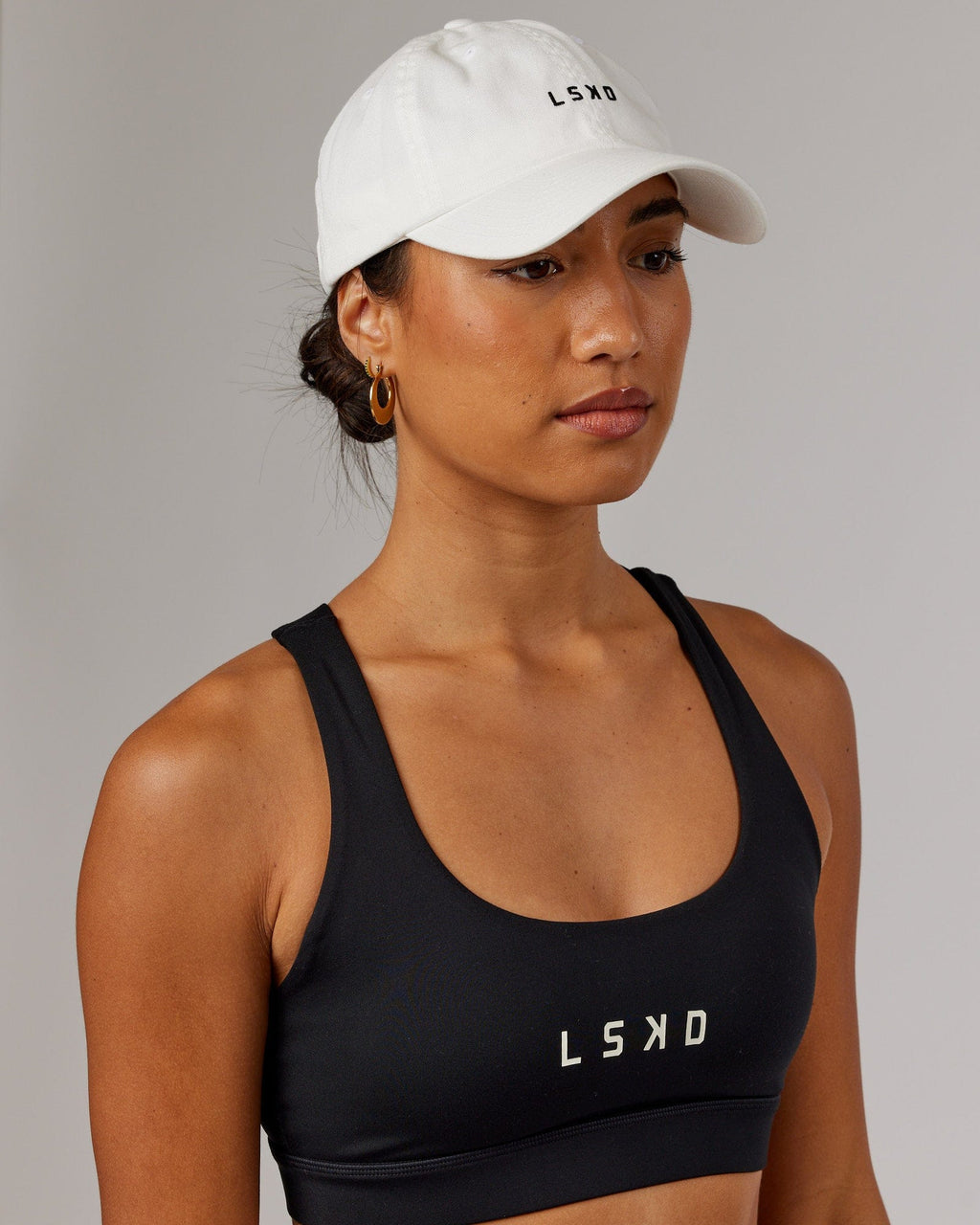 Model wearing Compact Cap - White