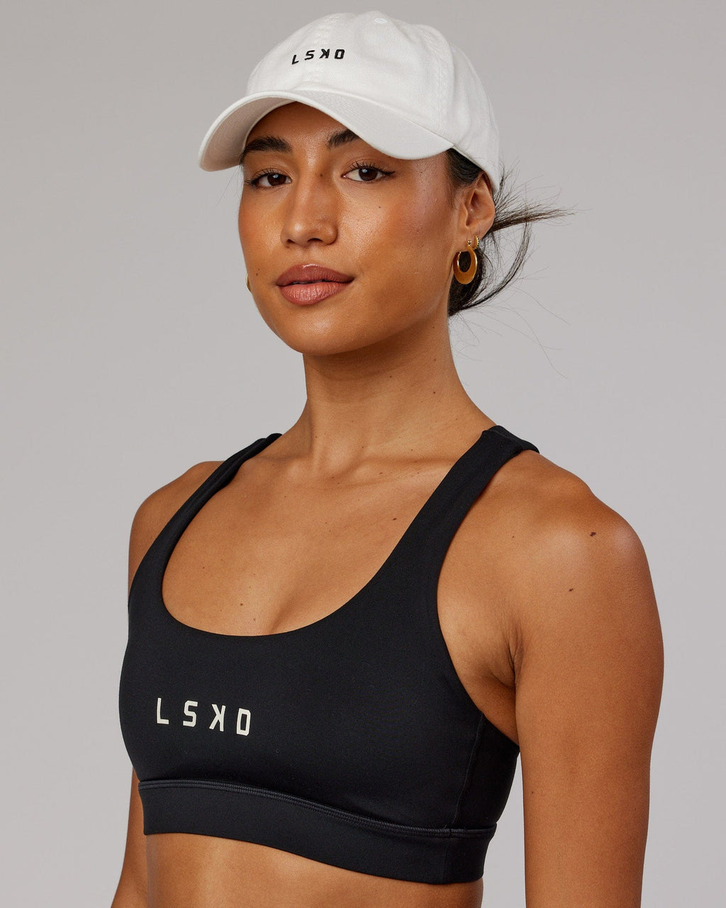 Model wearing Compact Cap - White