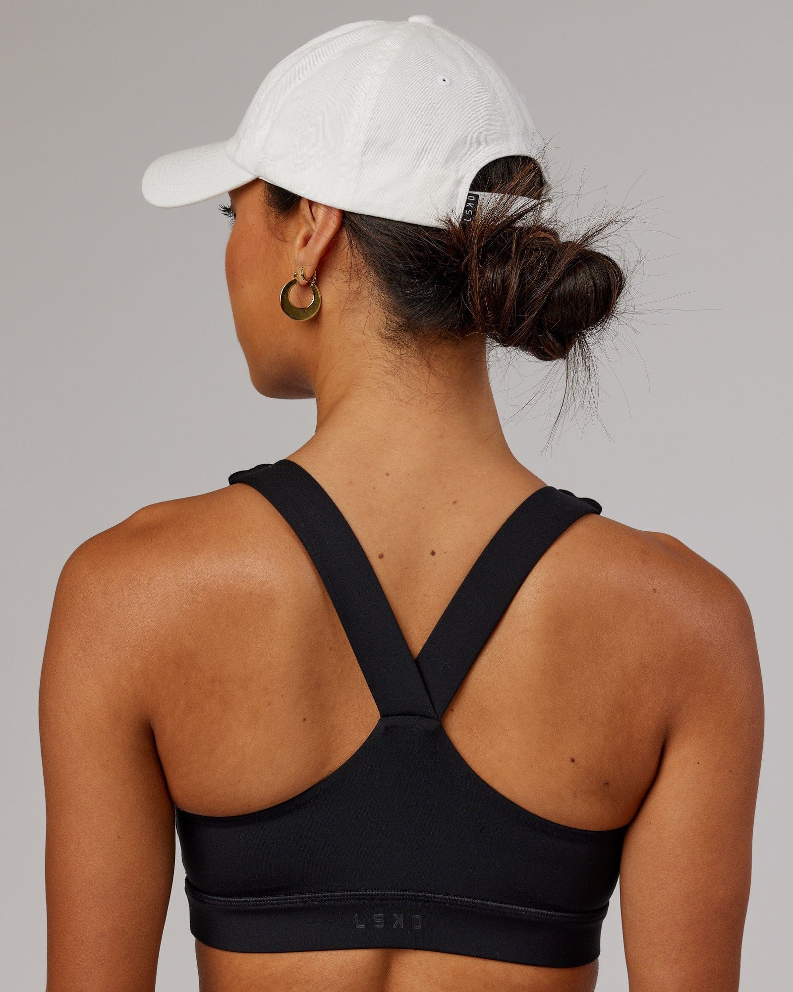 Model wearing Compact Cap - White