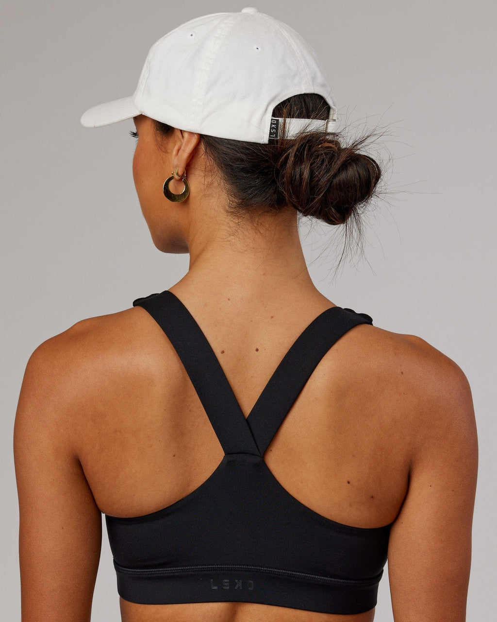 Model wearing Compact Cap - White-Flamingo