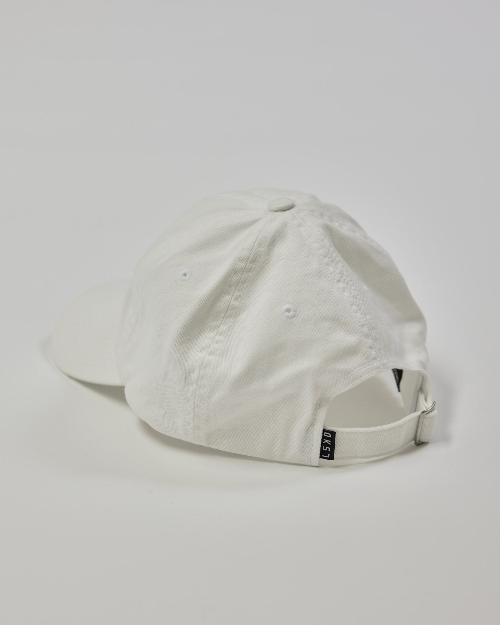 Model wearing Compact Cap - White-Flamingo