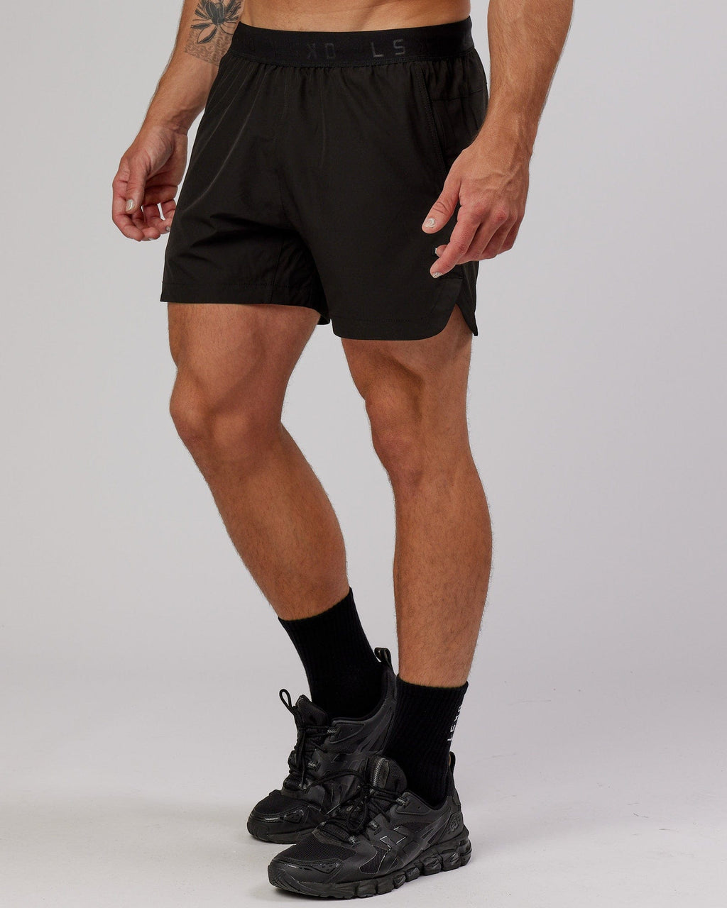 Model wearing Competition 5" Performance Short - Black