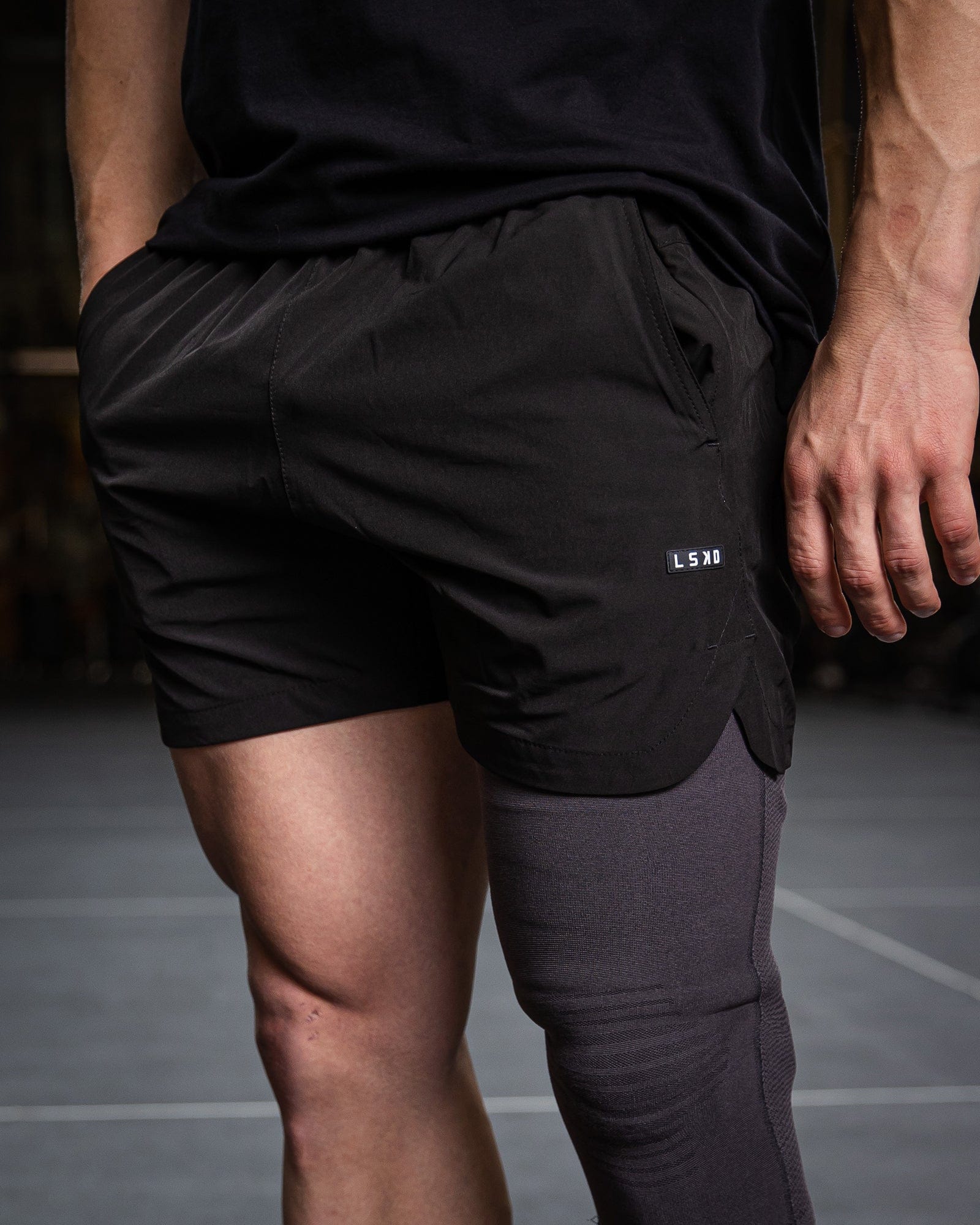 Model wearing Competition 5" Performance Short - Black