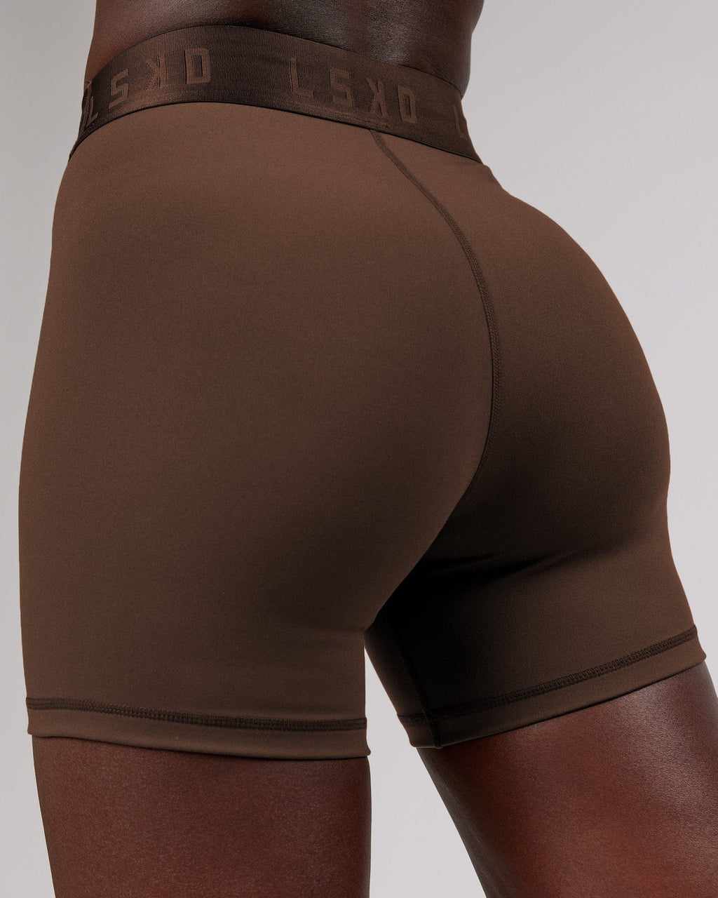 Model wearing Competition X-Short Tight - Walnut