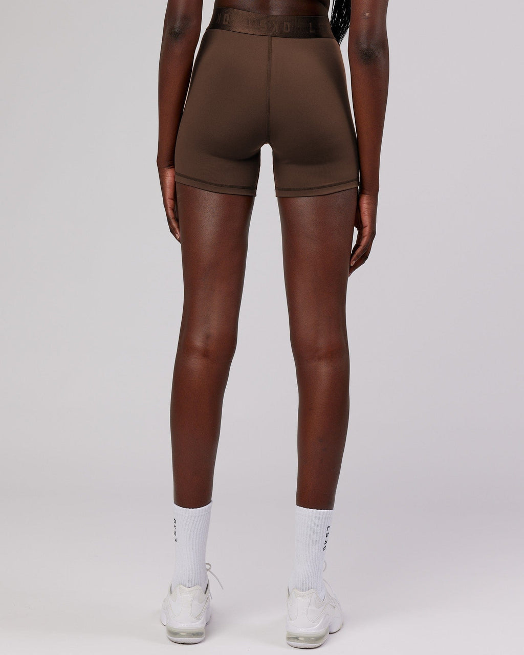Model wearing Competition X-Short Tight - Walnut