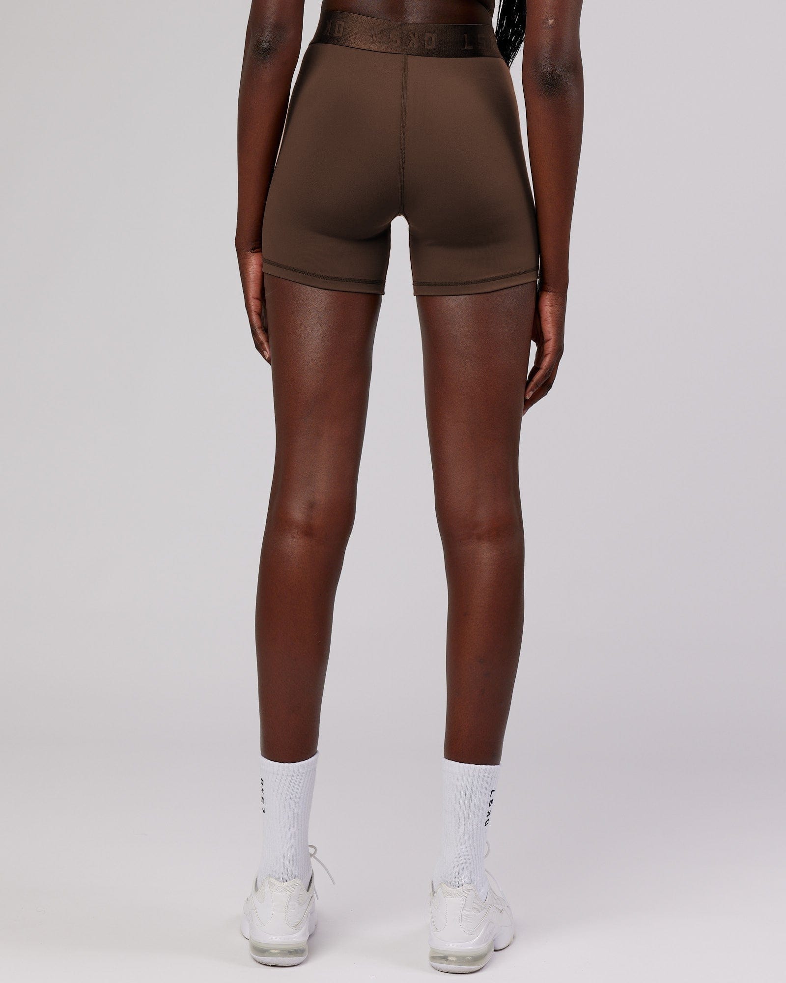 Model wearing Competition X-Short Tight - Walnut