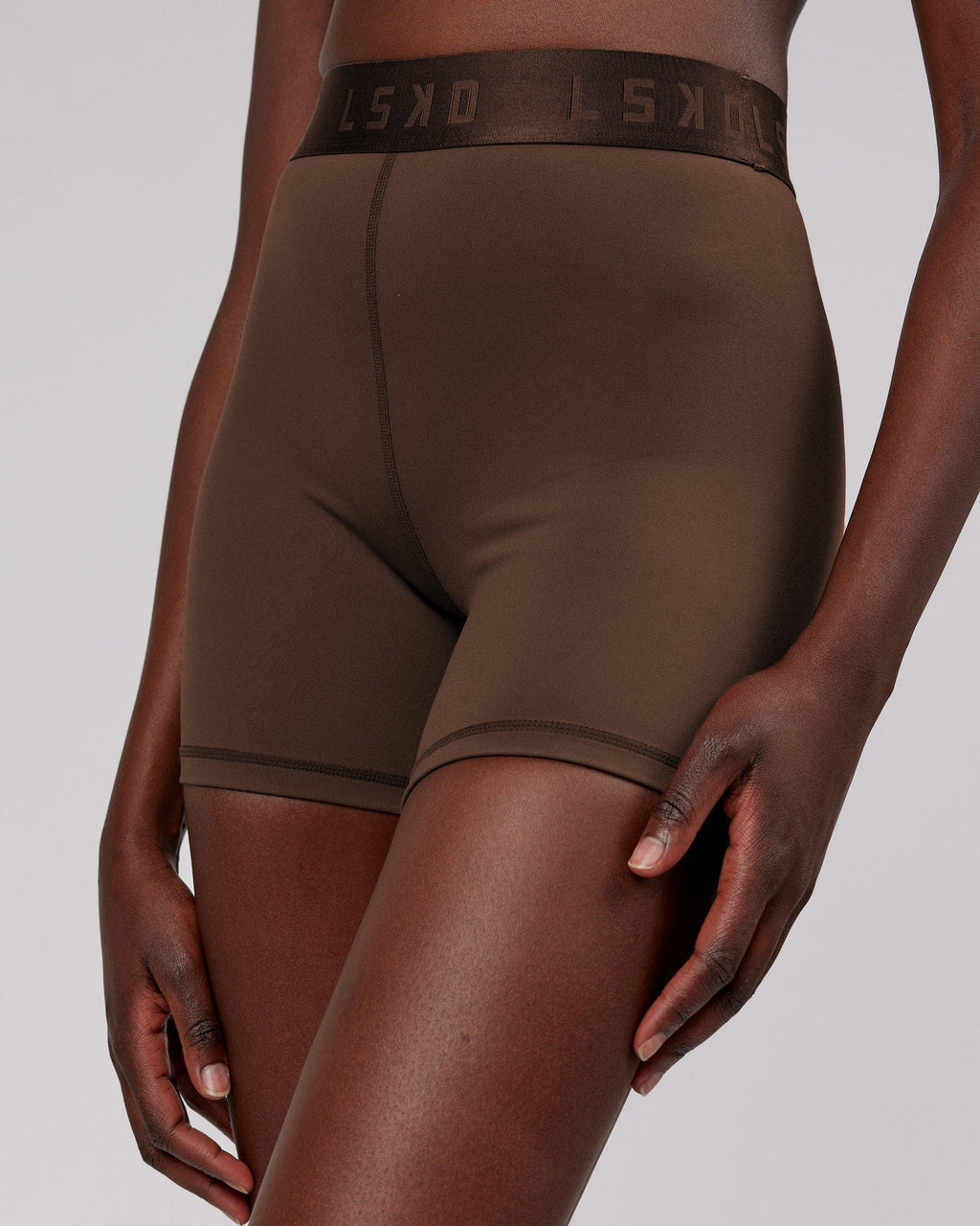 Model wearing Competition X-Short Tight - Walnut
