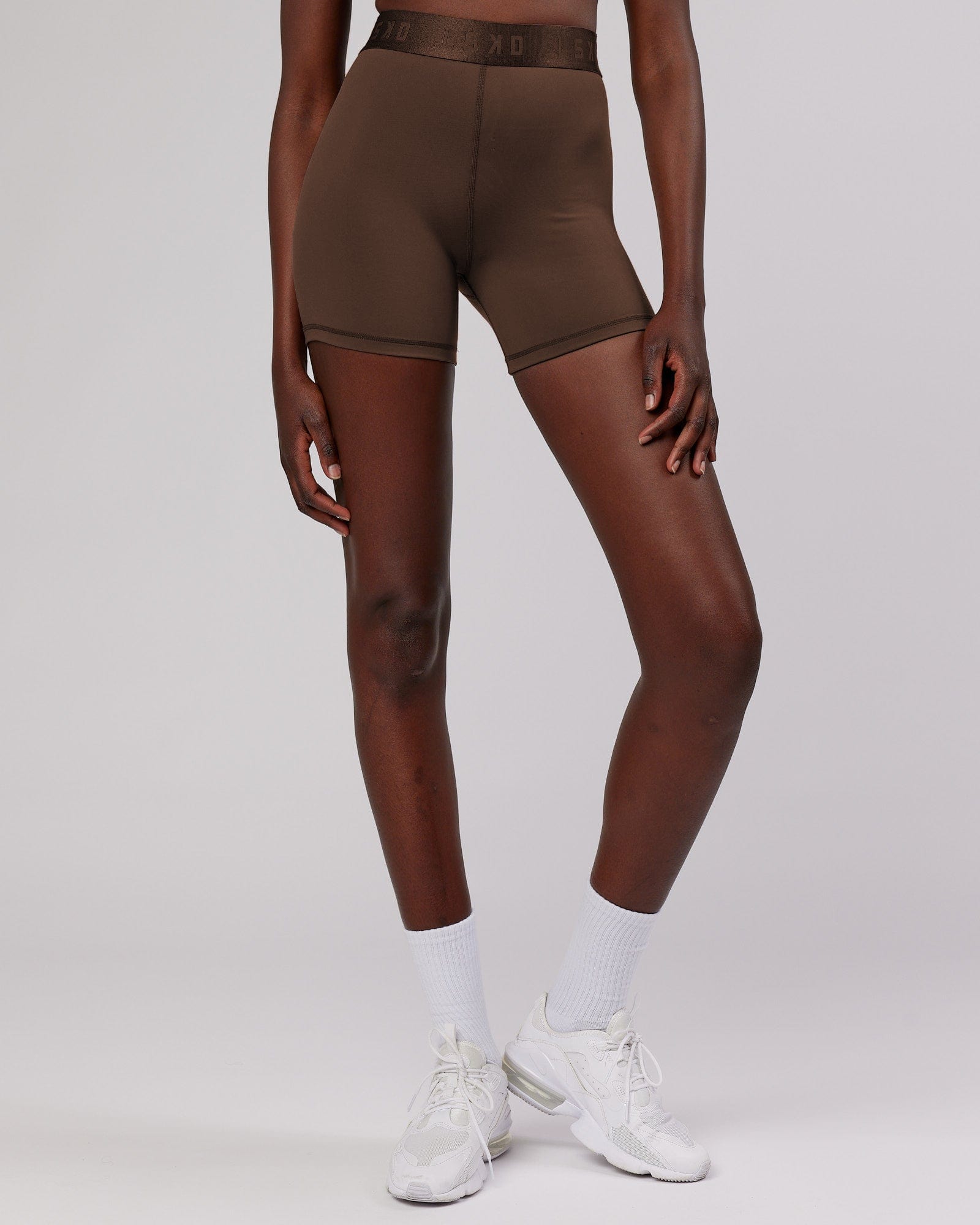 Model wearing Competition X-Short Tight - Walnut