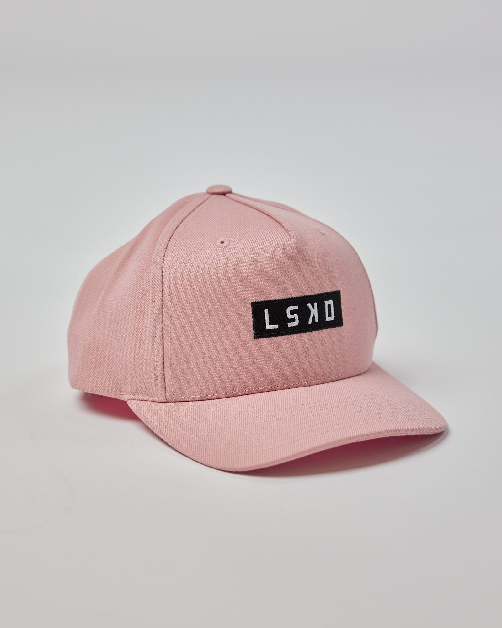 Model wearing Cornerstone Cap - Dusty Pink