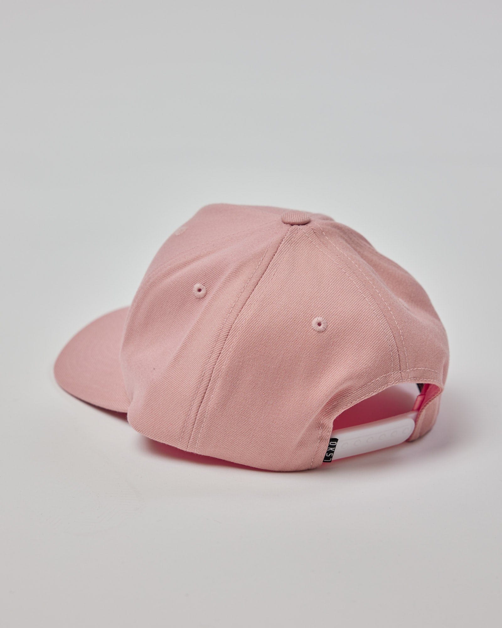 Model wearing Cornerstone Cap - Dusty Pink