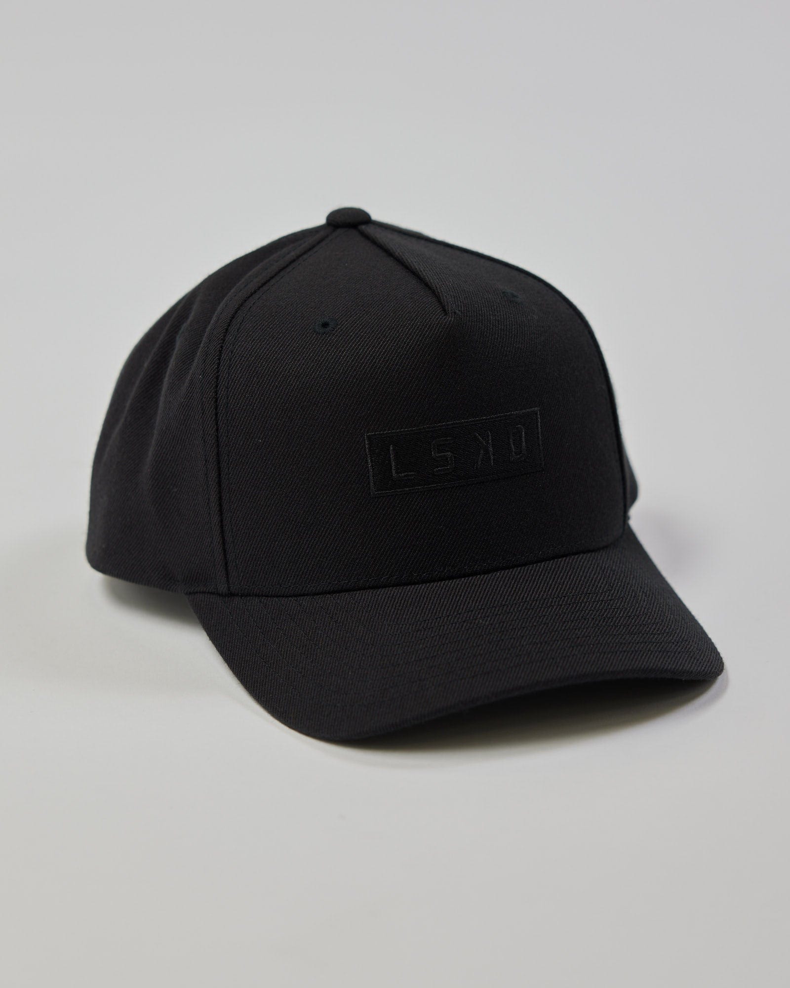 Model wearing Cornerstone Snapback Cap - Black-Black