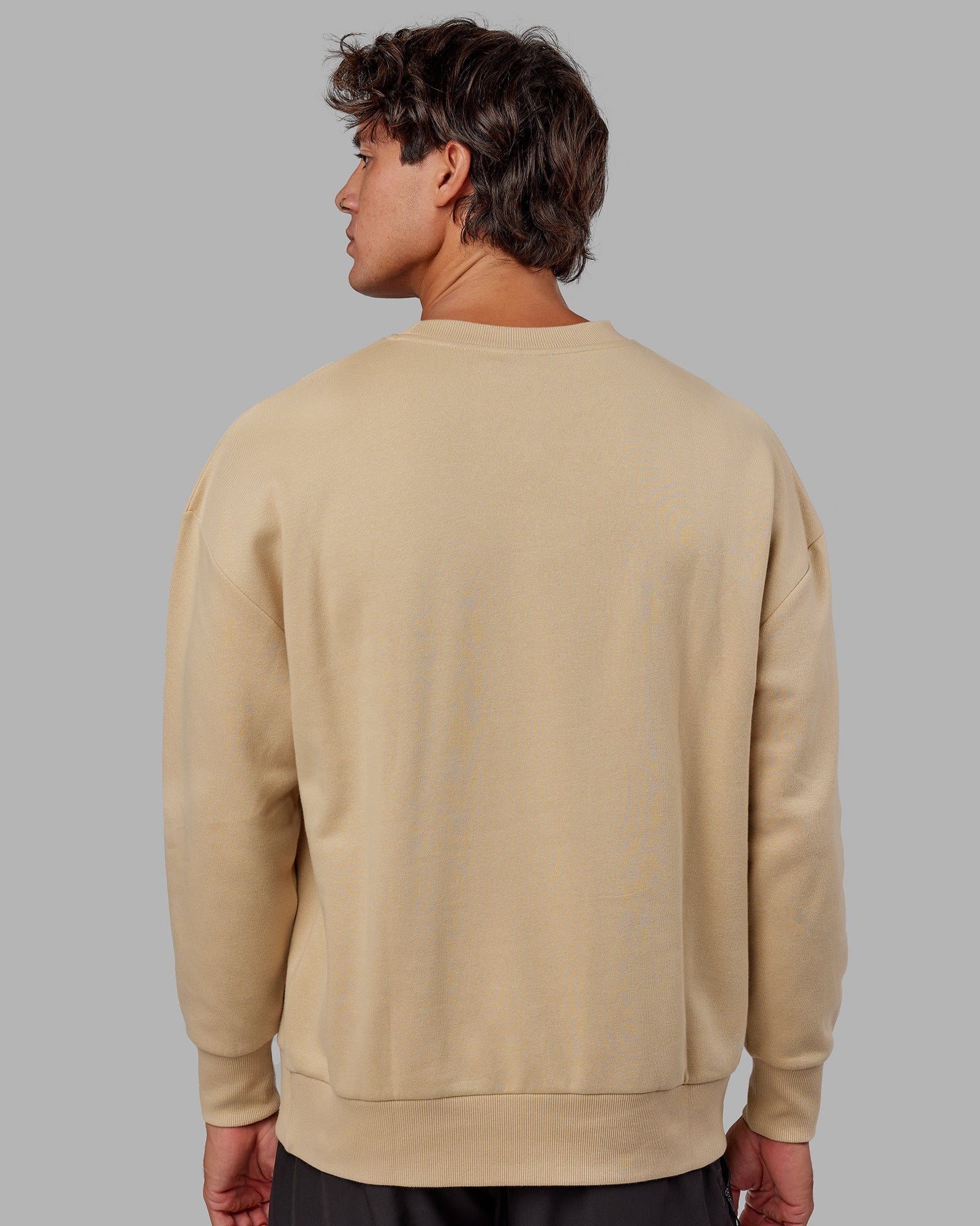 Model wearing Cornerstone Sweater Oversize - Pale Khaki
