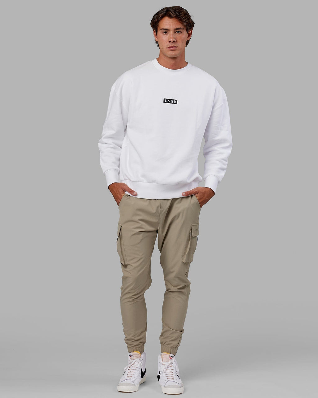 Model wearing Cornerstone Sweater Oversize - White