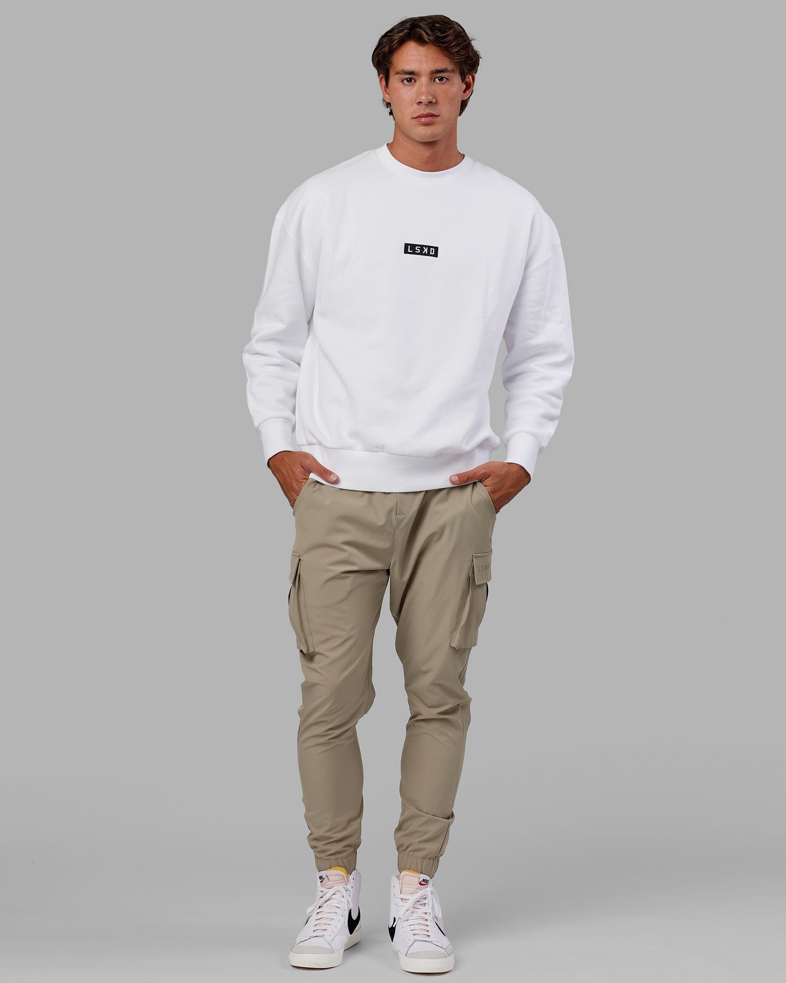 Model wearing Cornerstone Sweater Oversize - White