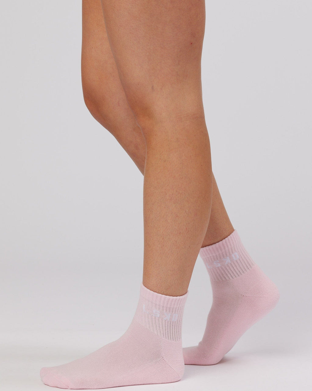 Model wearing Daily Quarter Sock 3 Pack - Multi Pink