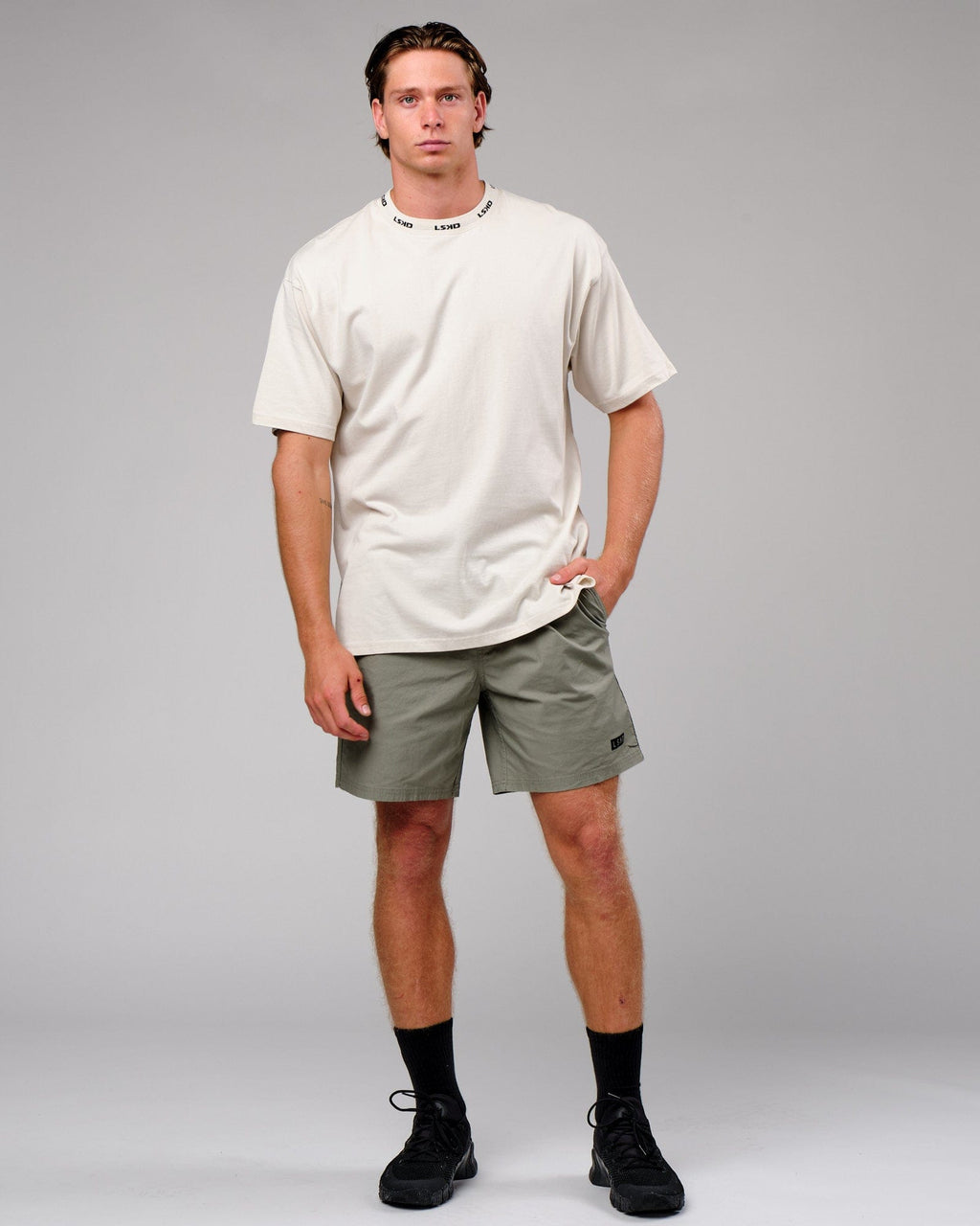 Model wearing Daily Short - Dusty Olive