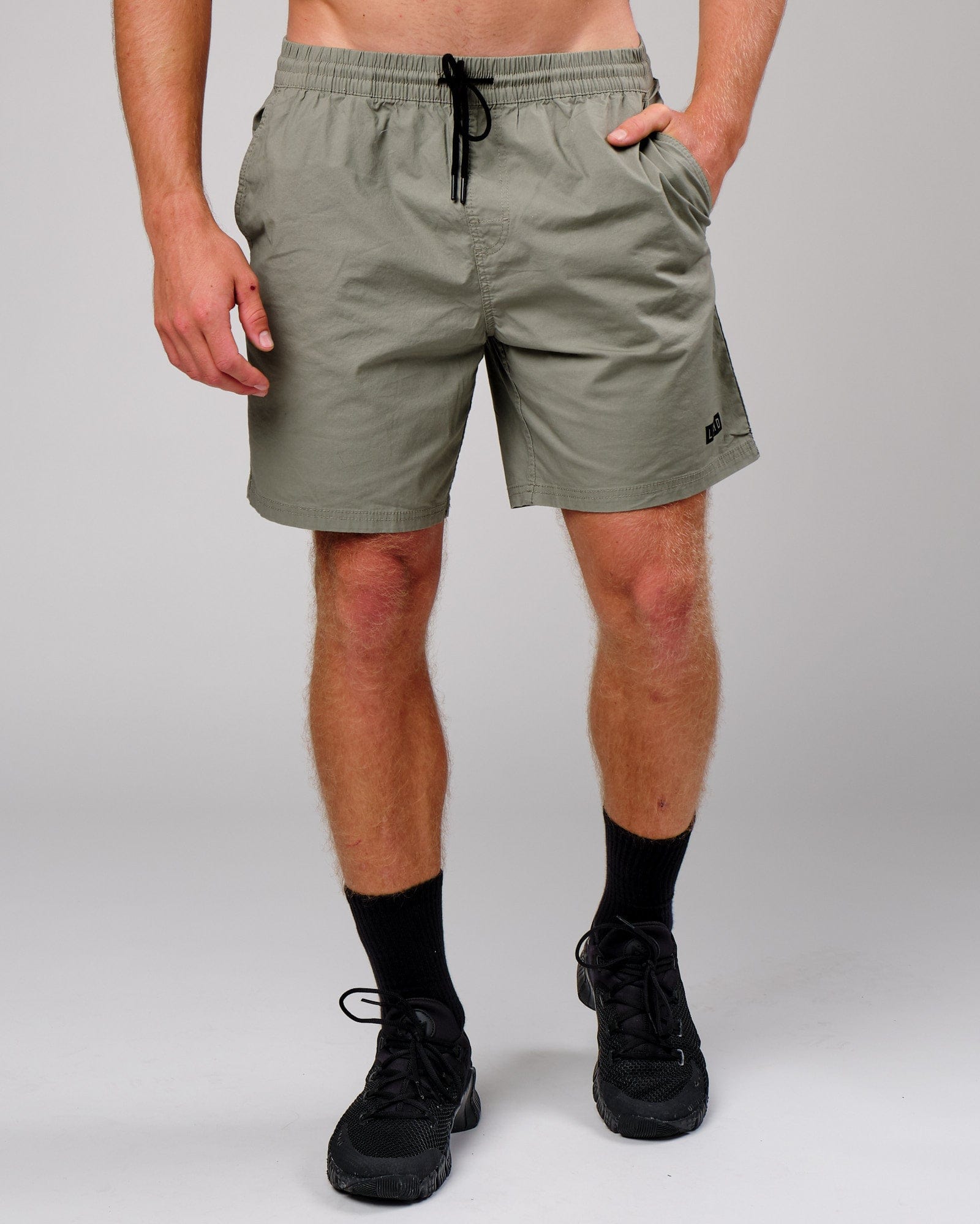 Model wearing Daily Short - Dusty Olive