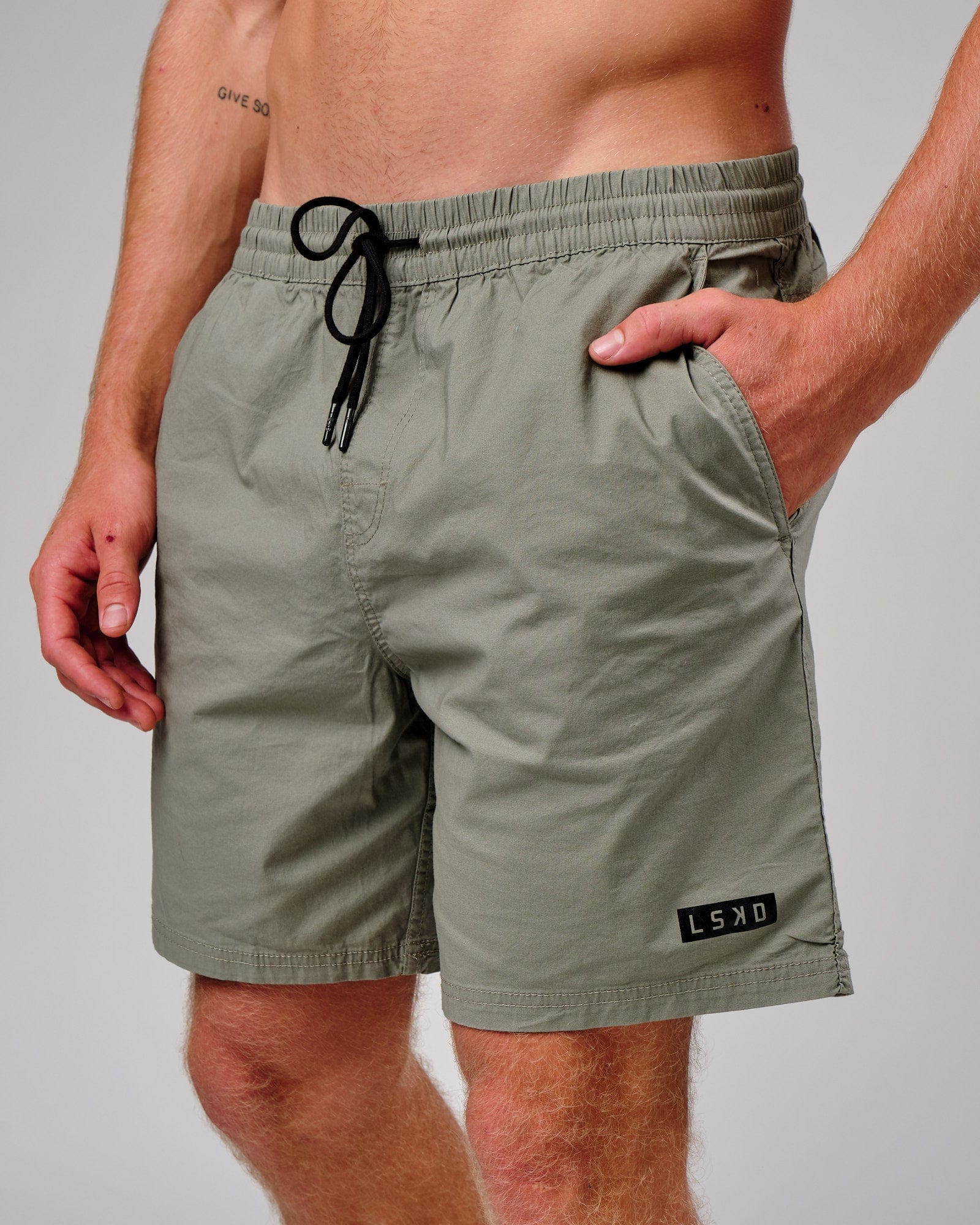 Model wearing Daily Short - Dusty Olive