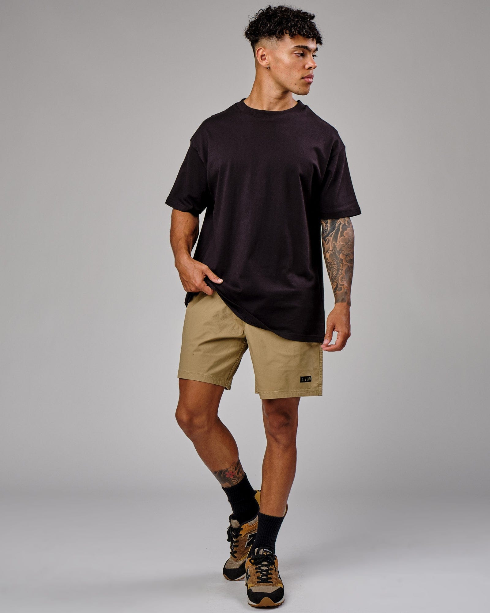 Model wearing Daily Short - Latte