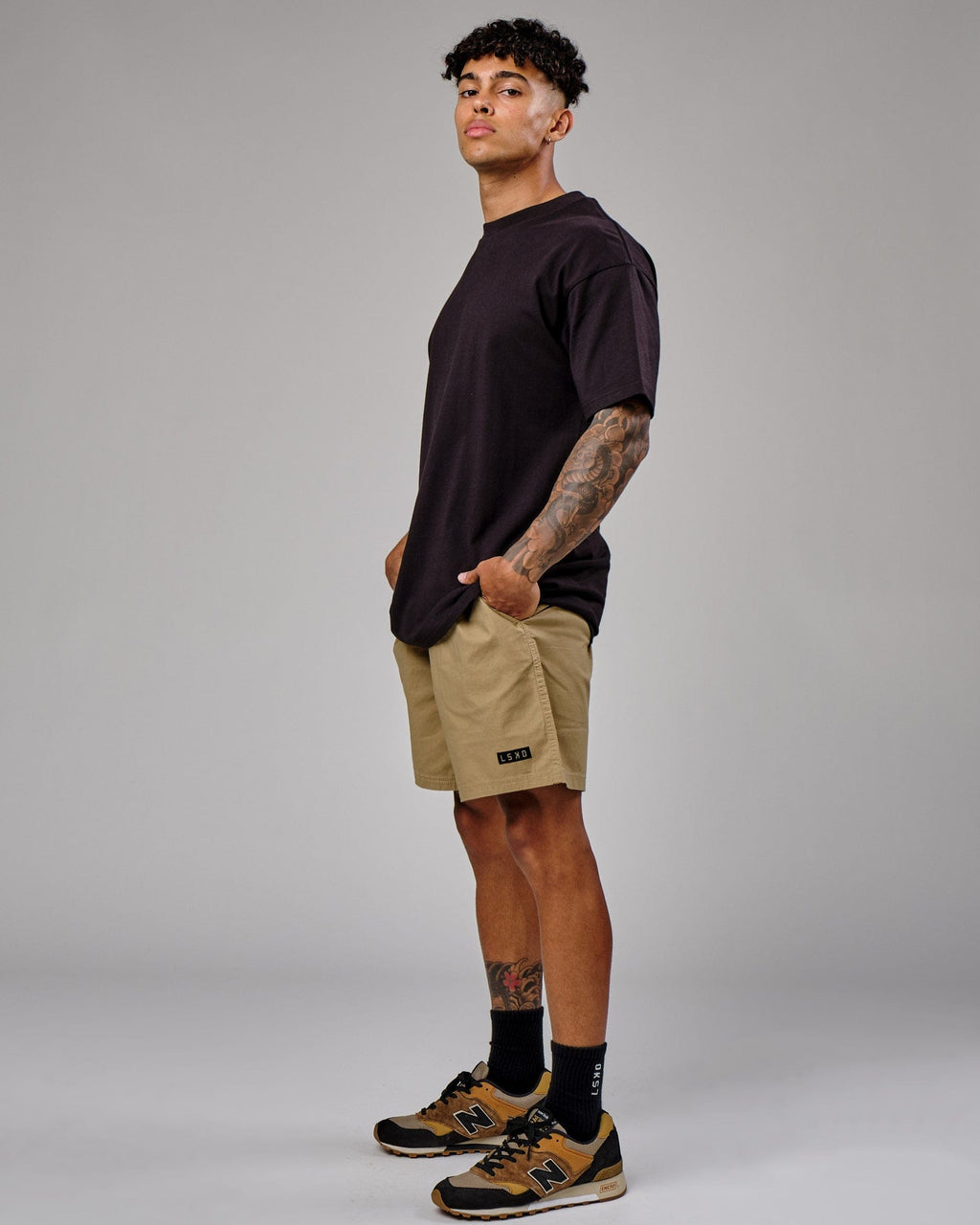 Model wearing Daily Short - Latte