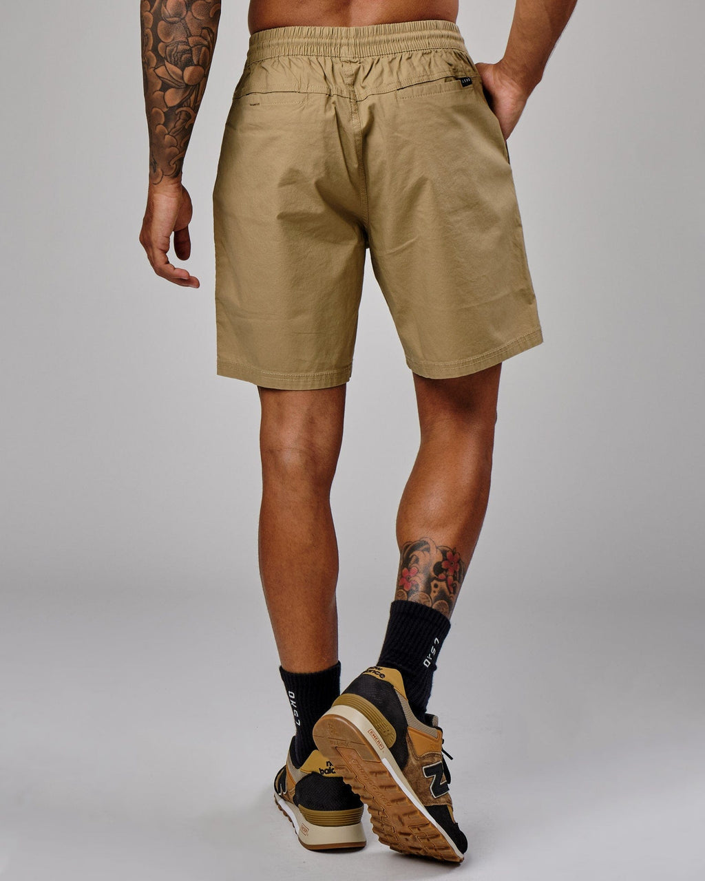 Model wearing Daily Short - Latte