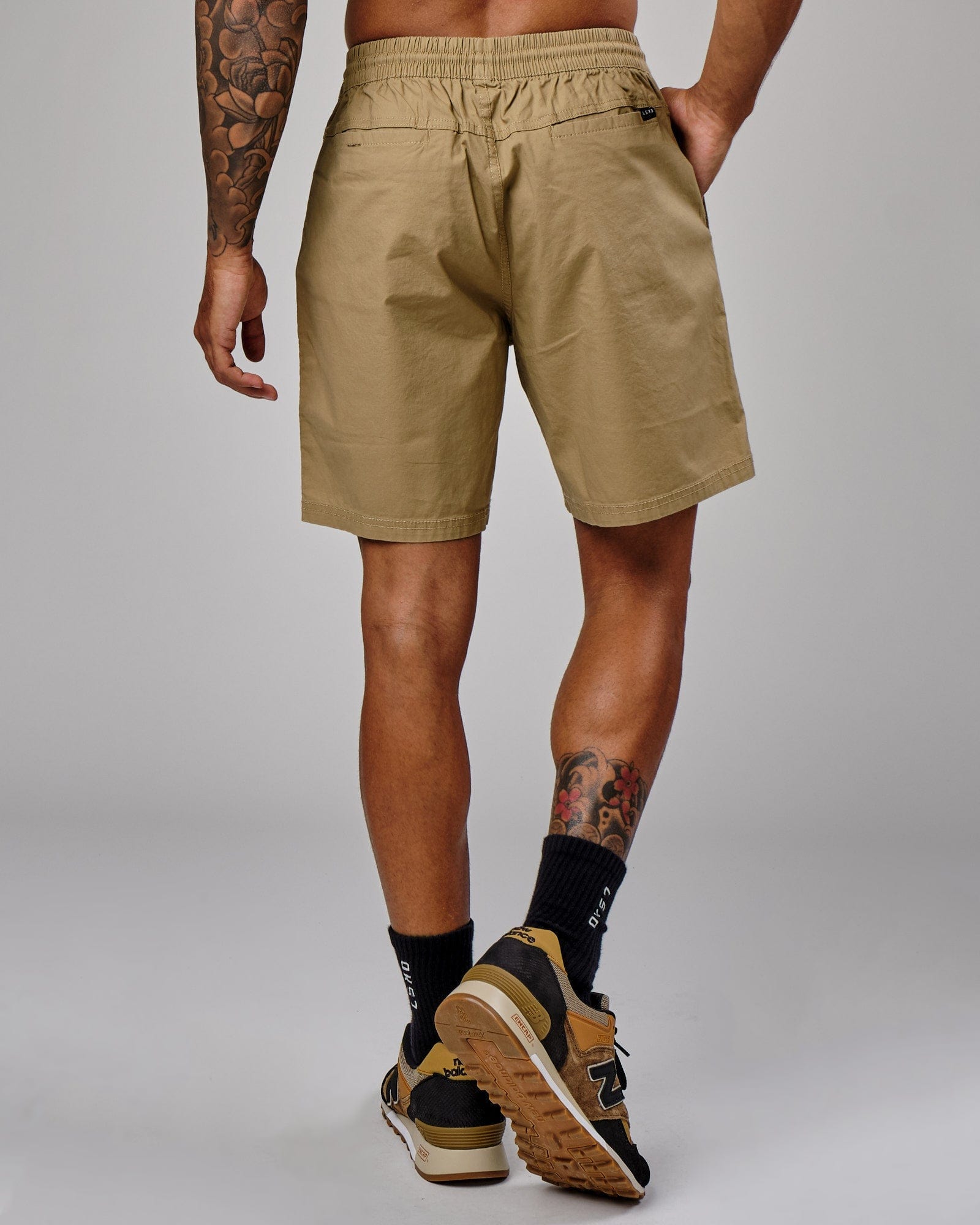 Model wearing Daily Short - Latte