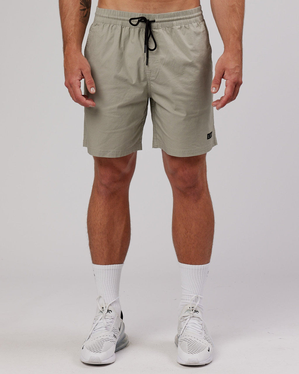 Model wearing Daily Short - Stone