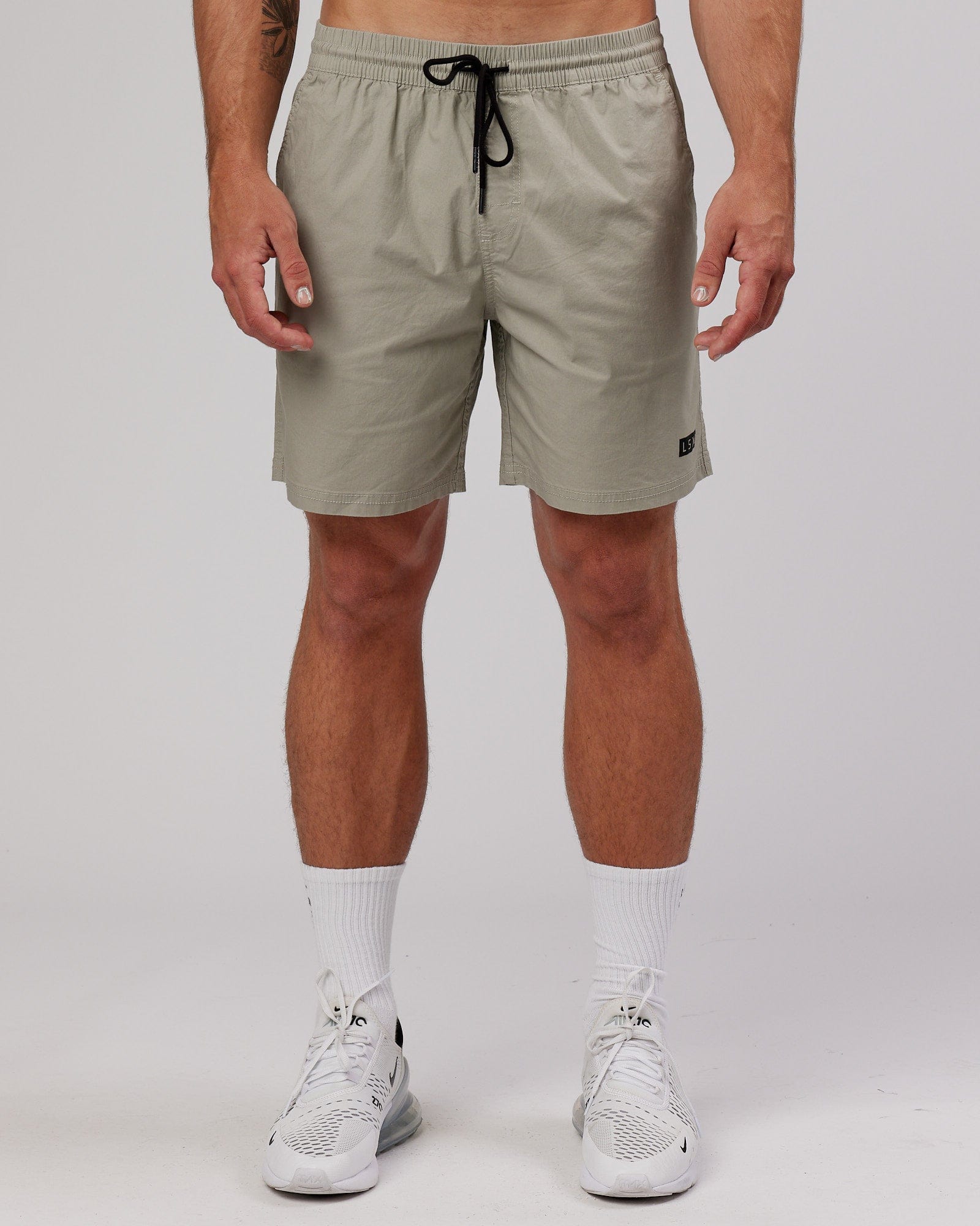 Model wearing Daily Short - Stone